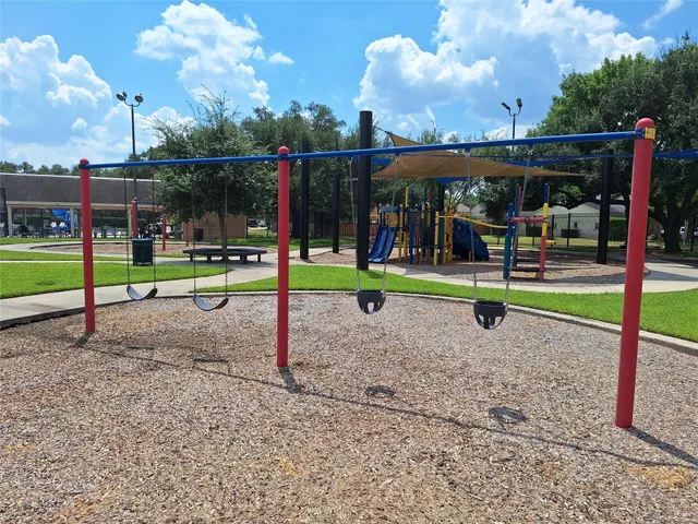 a view of a park with slide
