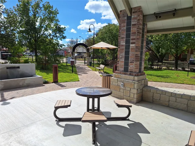 a view of swimming pool with a yard