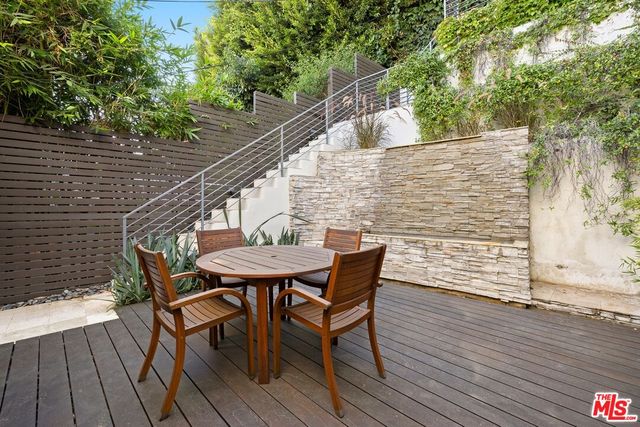 a view of outdoor seating area with furniture