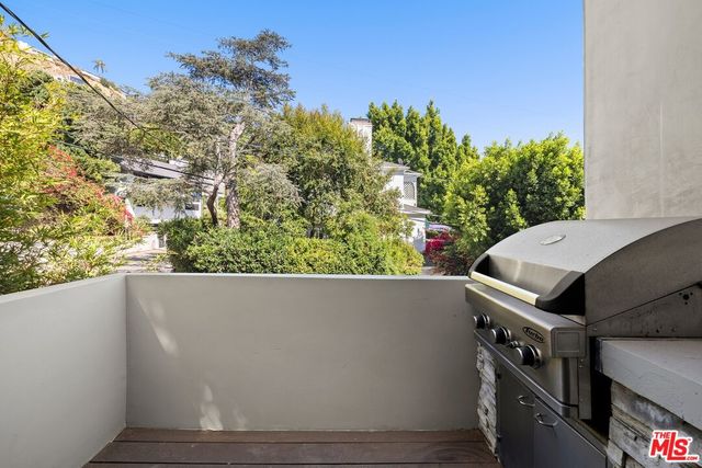 a bedroom with a bed and a fireplace