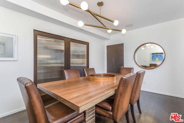 a view of a room with furniture and window