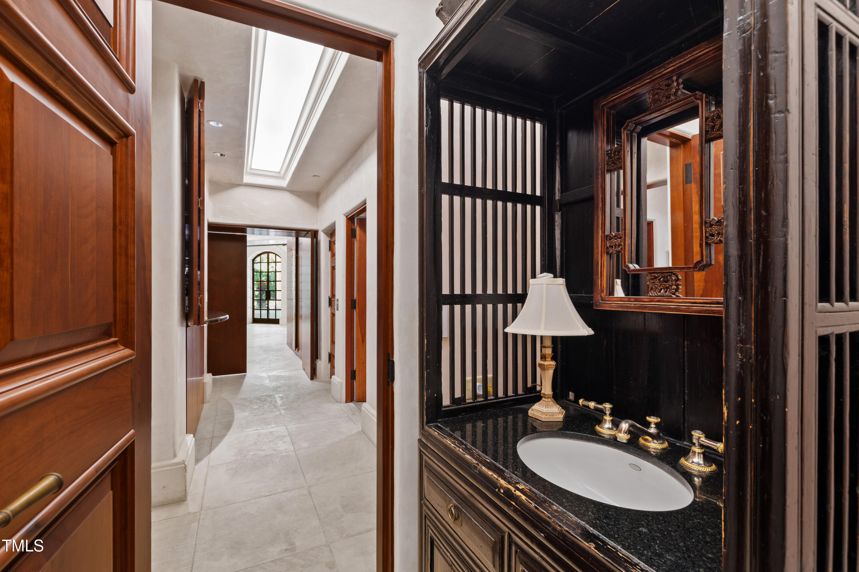 6510 New Market Way Raleigh, NC 27615 - Photo 30 of 95 a bathroom with a sink vanity granite and a mirror
