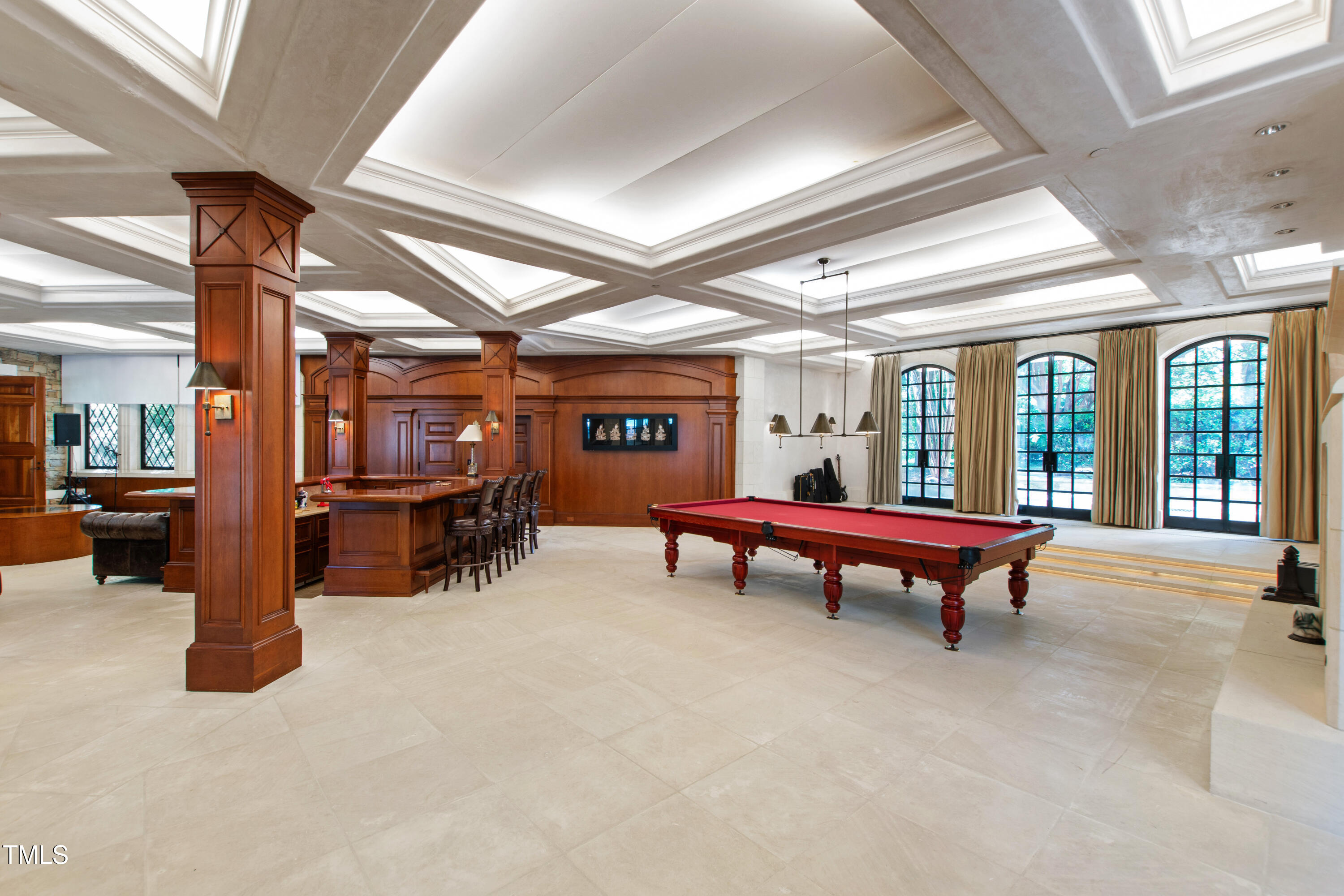 6510 New Market Way Raleigh, NC 27615 - Photo 32 of 95 a room with lots of furniture and a chandelier