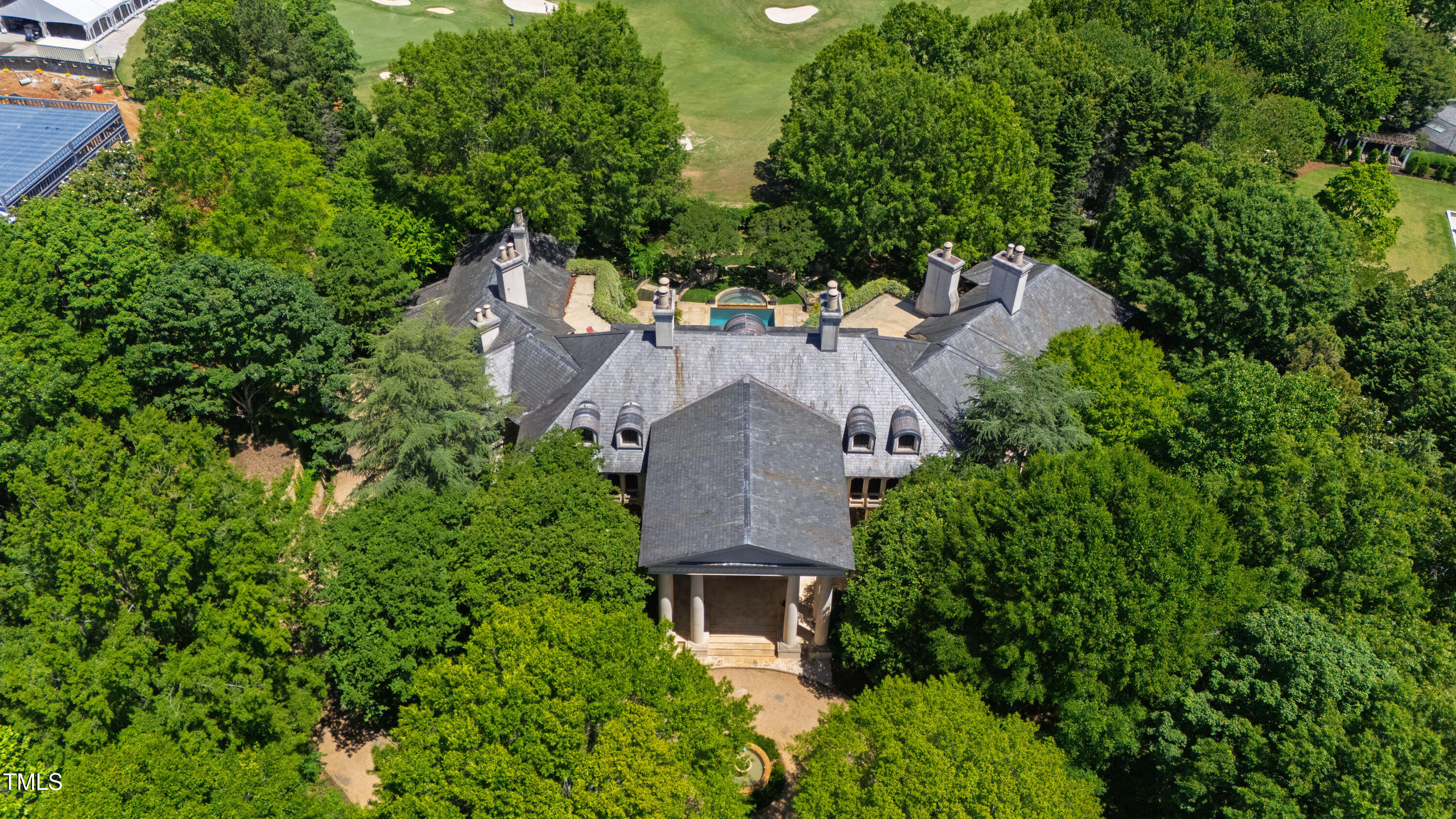 6510 New Market Way Raleigh, NC 27615 - Photo 4 of 95 an aerial view of a house with outdoor space and trees all around