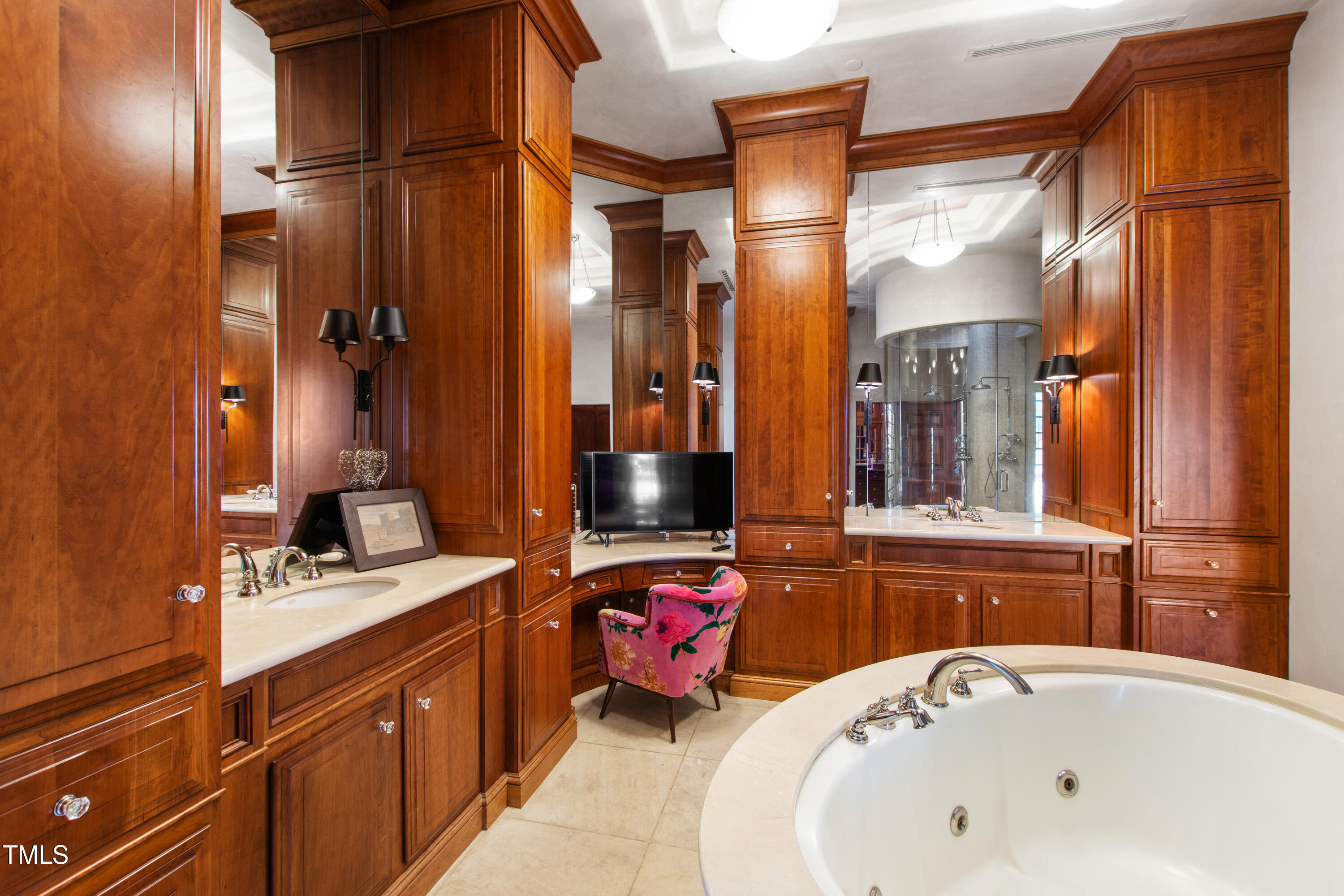 6510 New Market Way Raleigh, NC 27615 - Photo 41 of 95 a bathroom with a tub sink and mirror