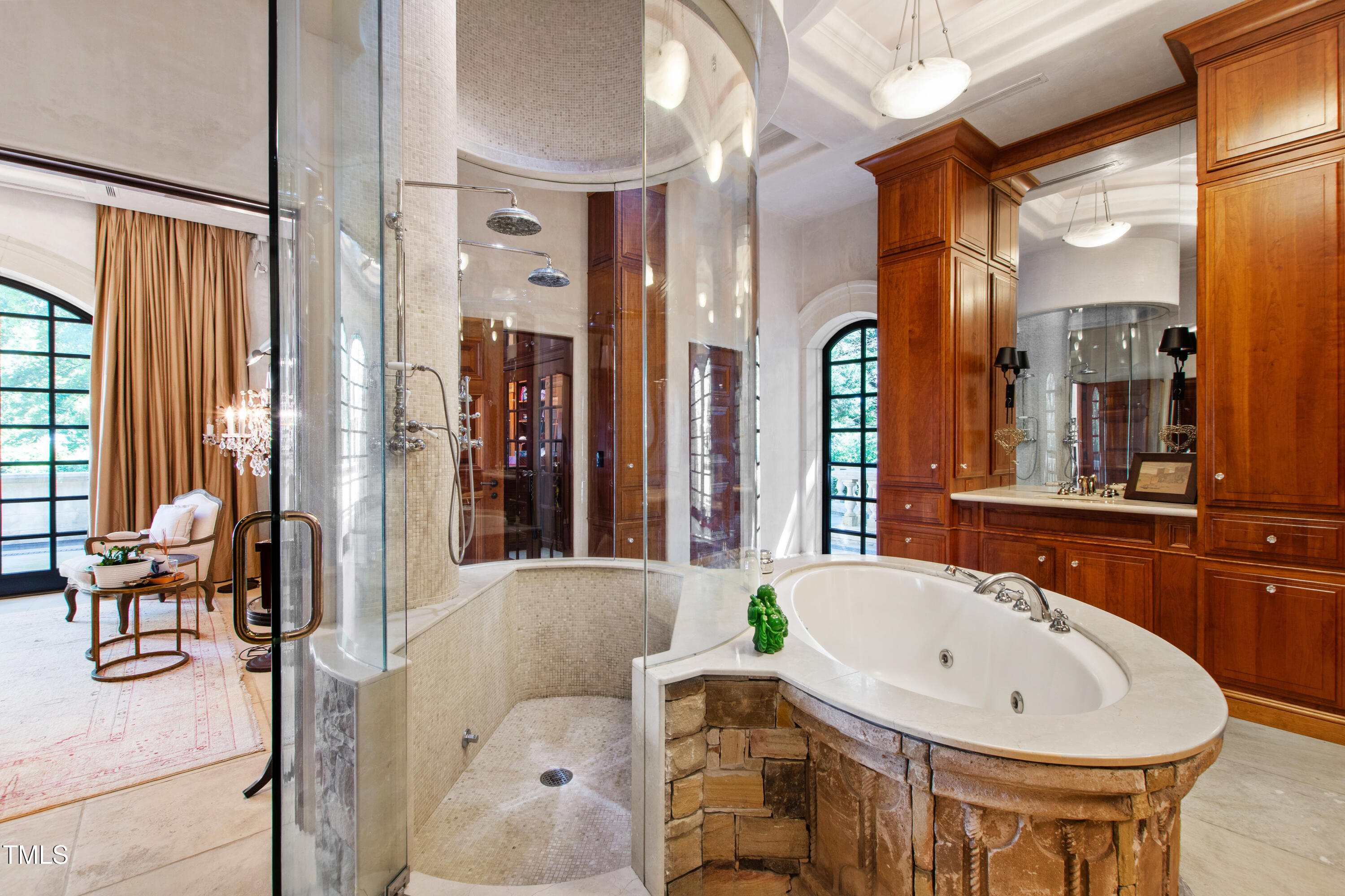 6510 New Market Way Raleigh, NC 27615 - Photo 42 of 95 a bathroom with a tub sink and mirror