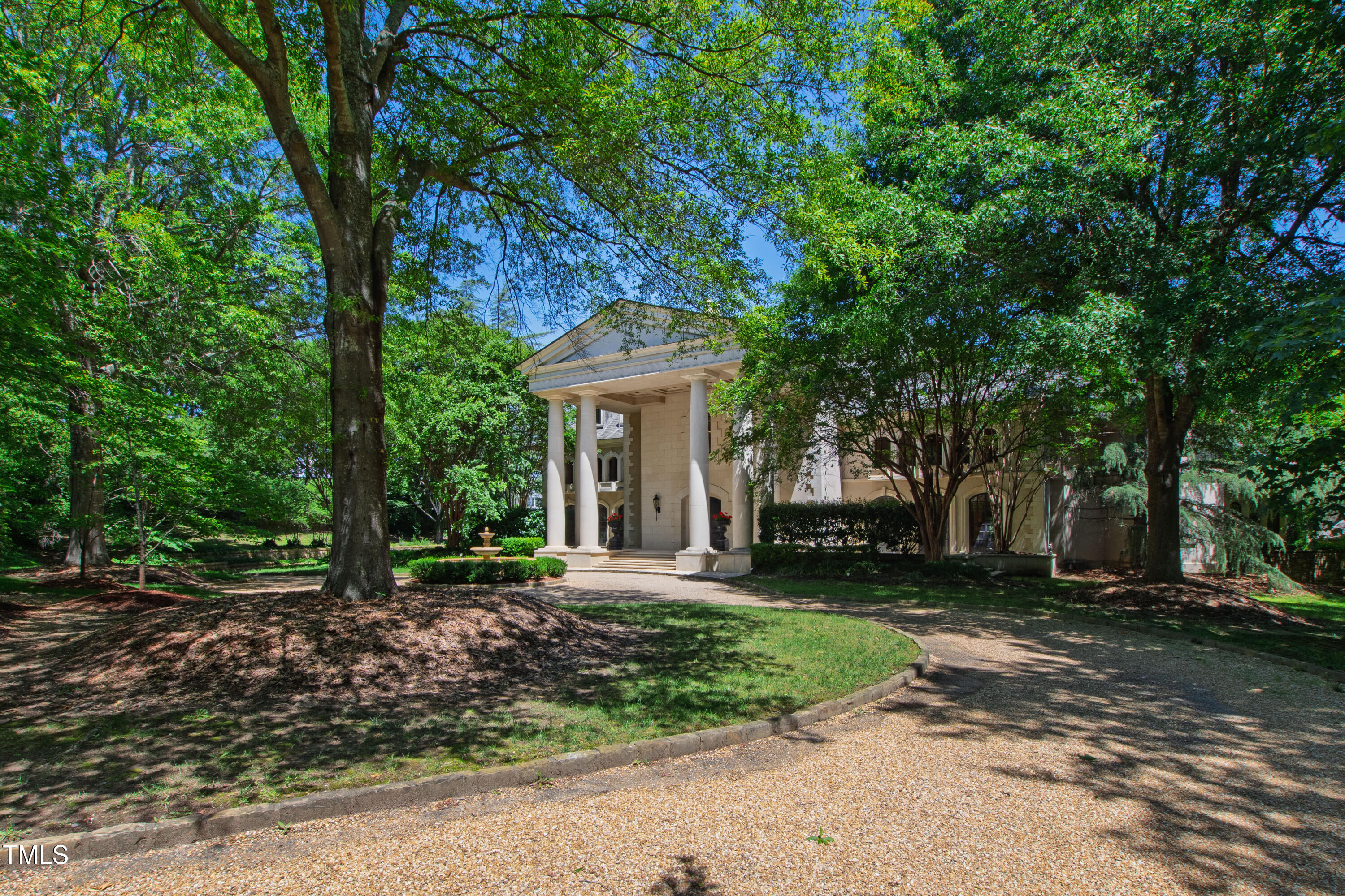 6510 New Market Way Raleigh, NC 27615 - Photo 6 of 95 a front view of a house with a garden