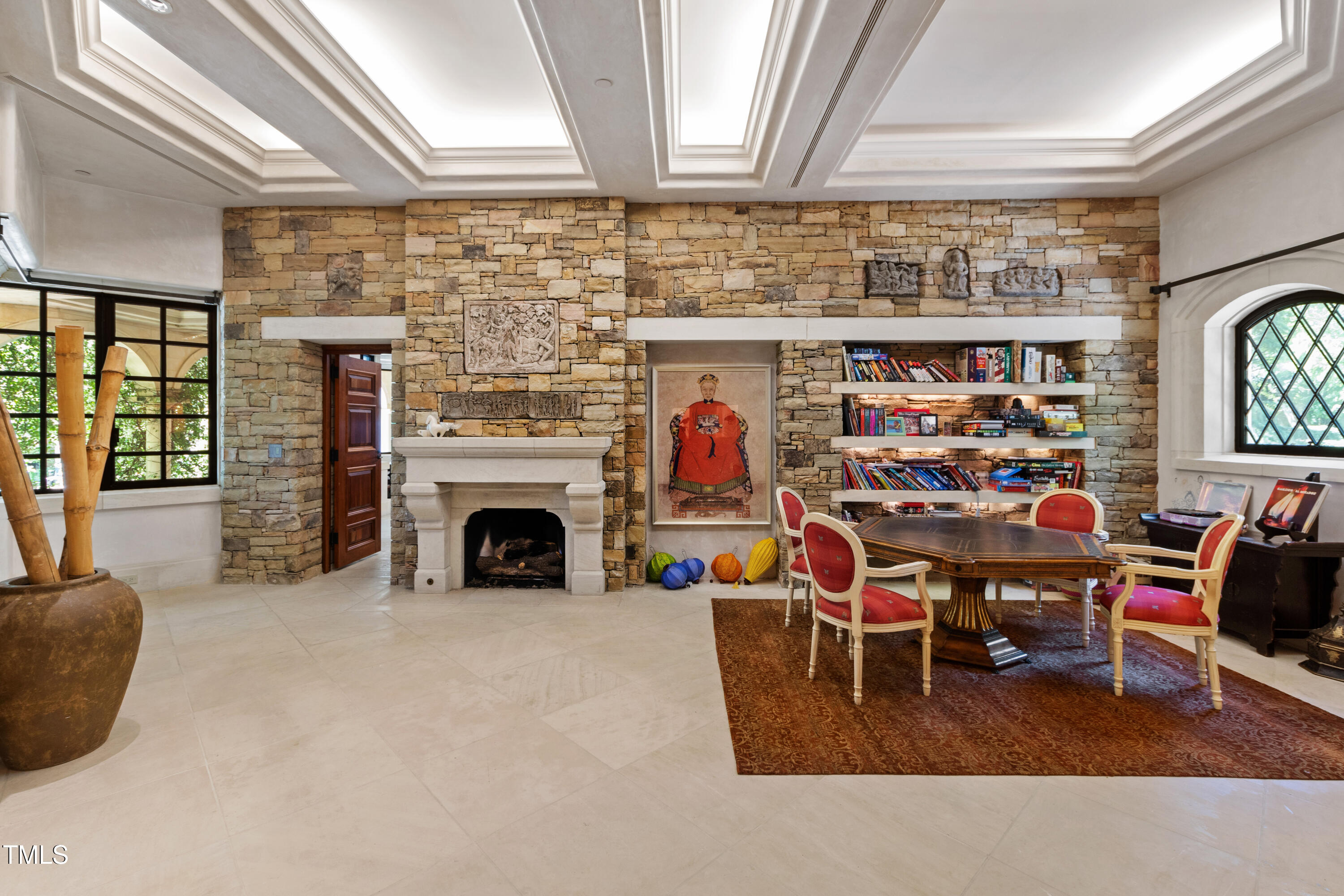 6510 New Market Way Raleigh, NC 27615 - Photo 71 of 95 a living room with furniture a fireplace and flat screen tv