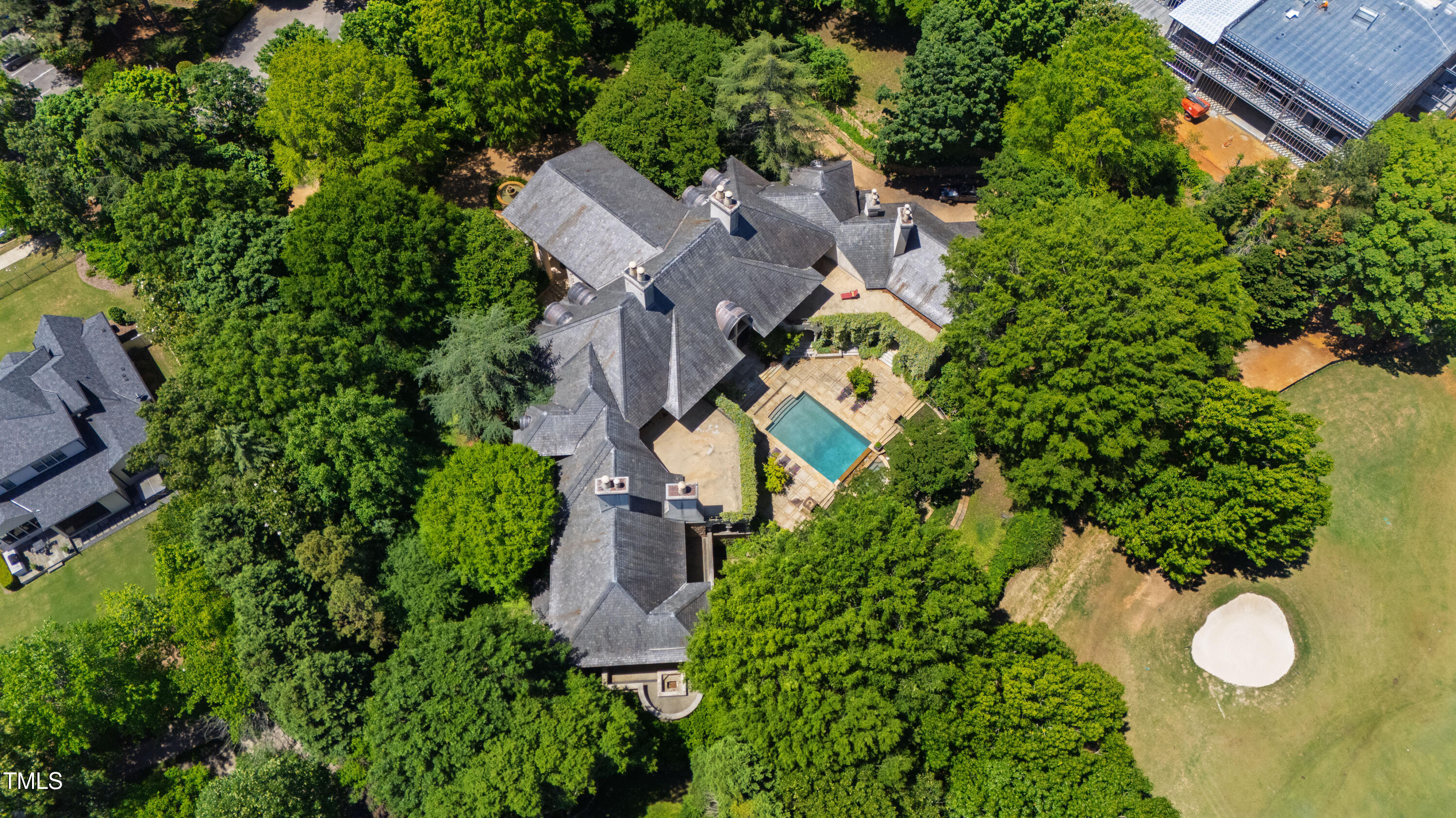 6510 New Market Way Raleigh, NC 27615 - Photo 90 of 95 an aerial view of a house with yard and swimming pool