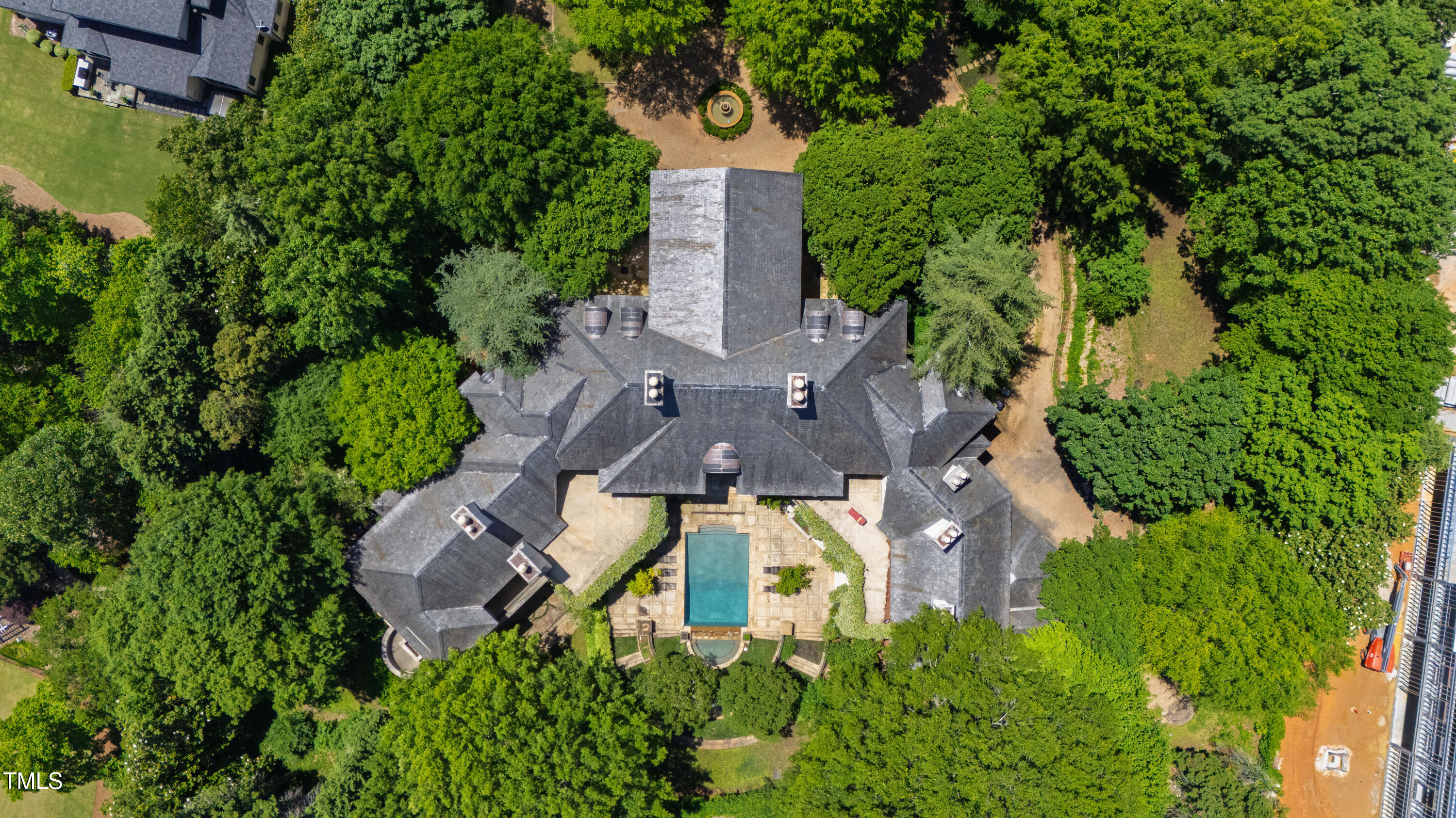 6510 New Market Way Raleigh, NC 27615 - Photo 91 of 95 an aerial view of a house with a garden and trees