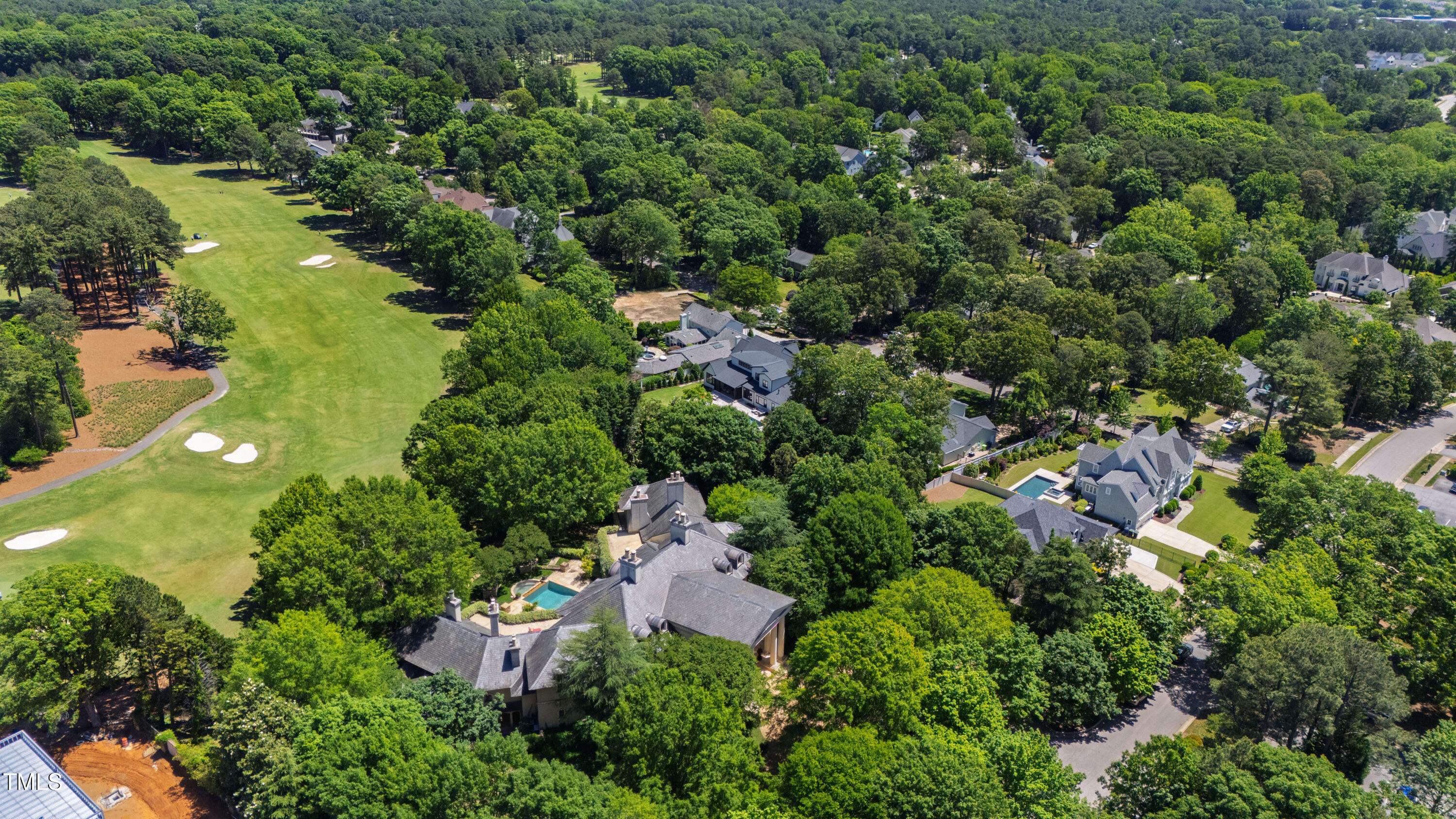 6510 New Market Way Raleigh, NC 27615 - Photo 92 of 95 an aerial view of residential houses with outdoor space and trees all around