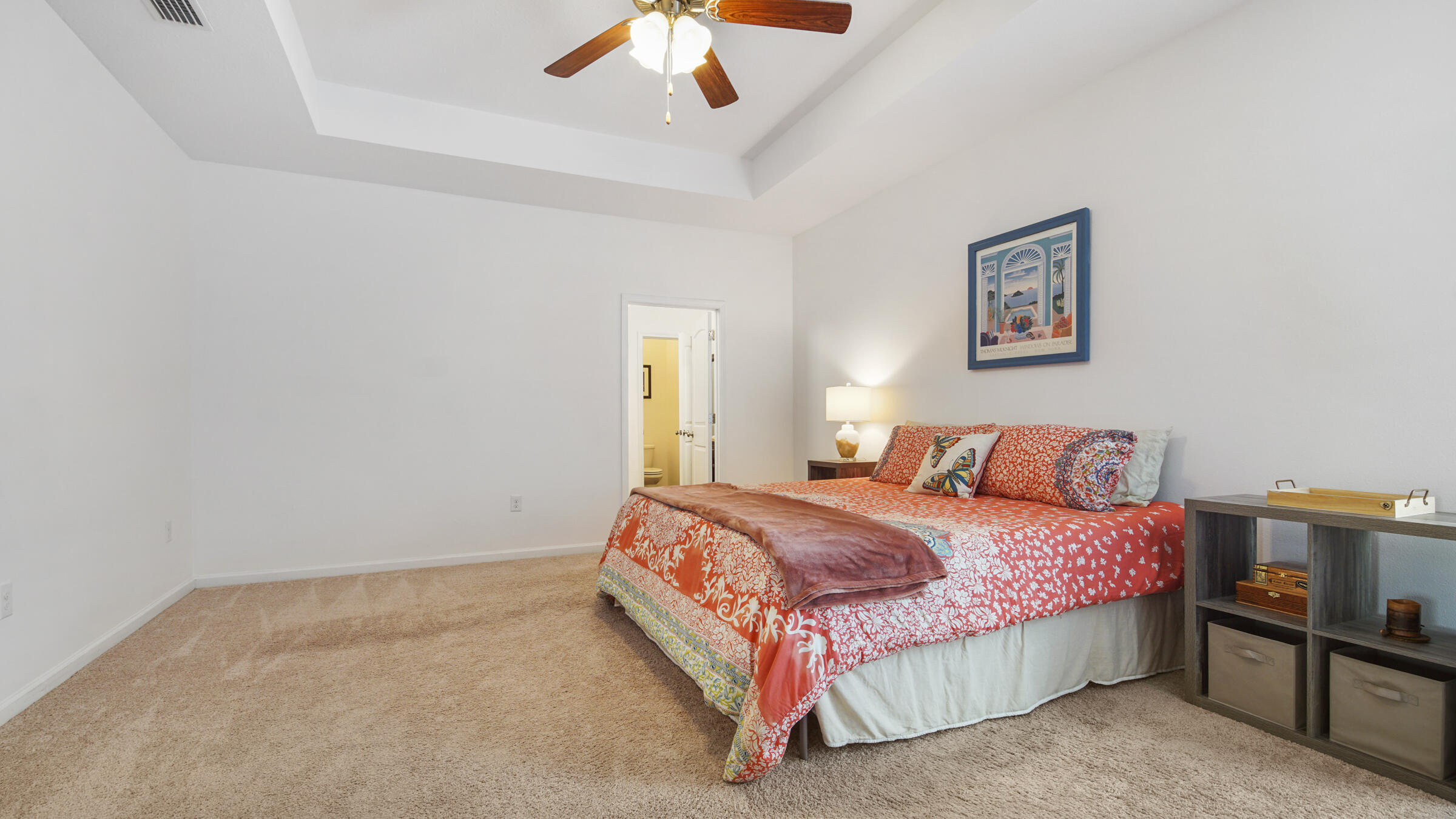 237 Nelly Street Freeport, FL 32439 - Photo 11 of 42 a bedroom with a bed and a painting on the wall