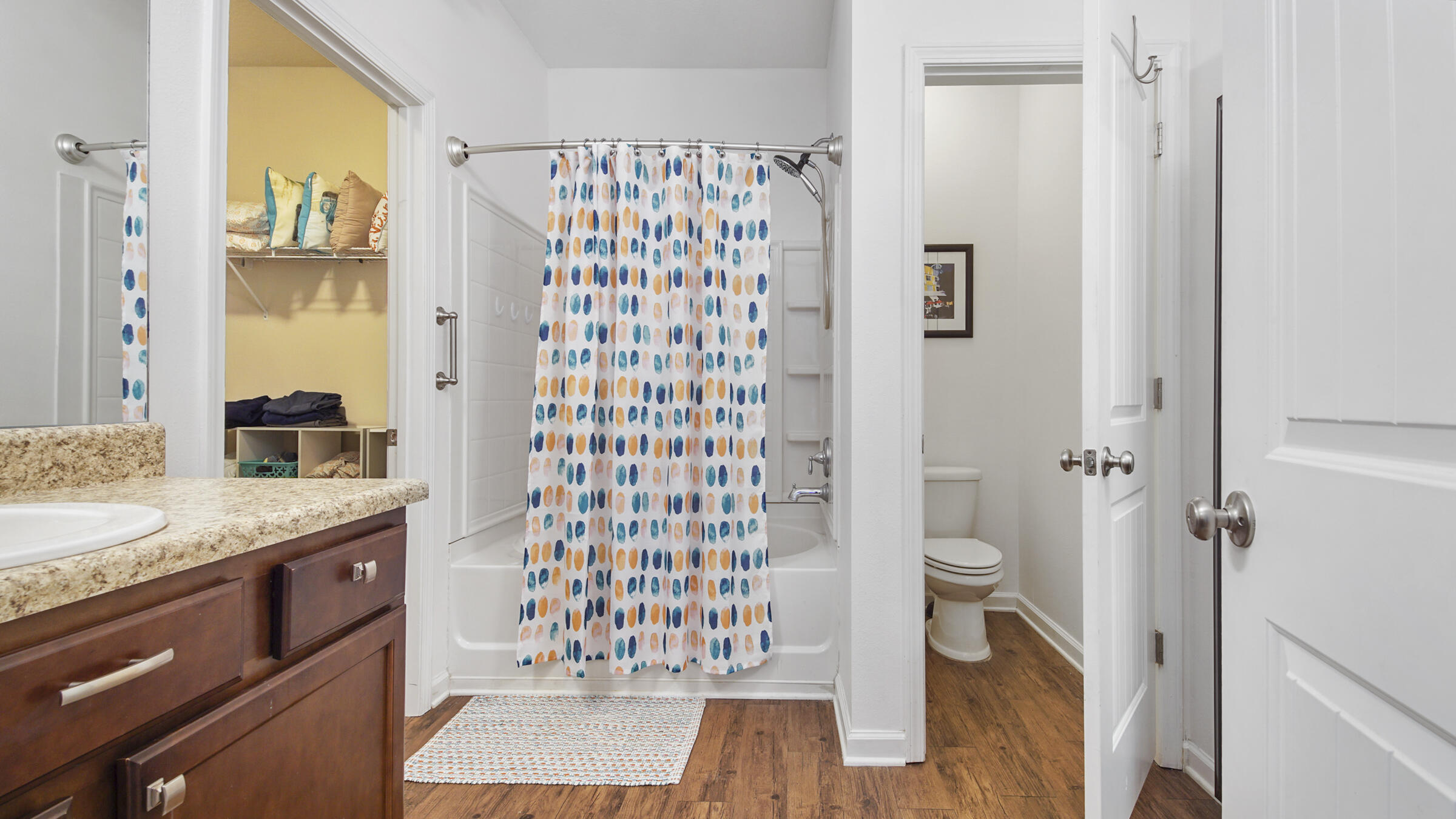 237 Nelly Street Freeport, FL 32439 - Photo 12 of 42 a bathroom with a granite countertop sink toilet and shower