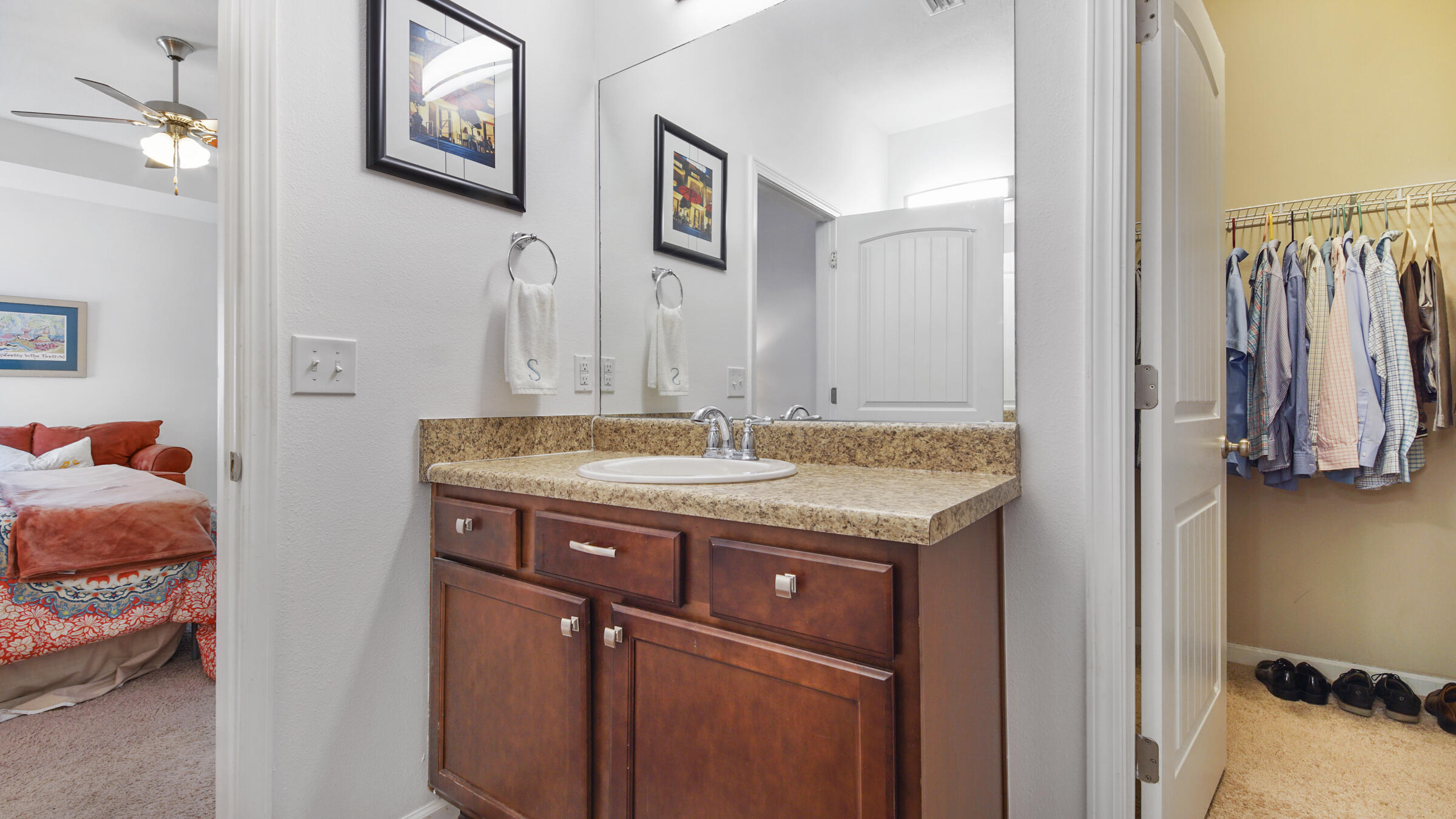 237 Nelly Street Freeport, FL 32439 - Photo 14 of 42 a bathroom with a granite countertop sink and a mirror
