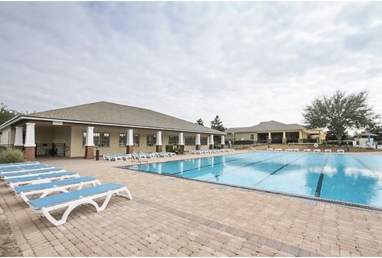 237 Nelly Street Freeport, FL 32439 - Photo 25 of 42 a front view of a house with garden