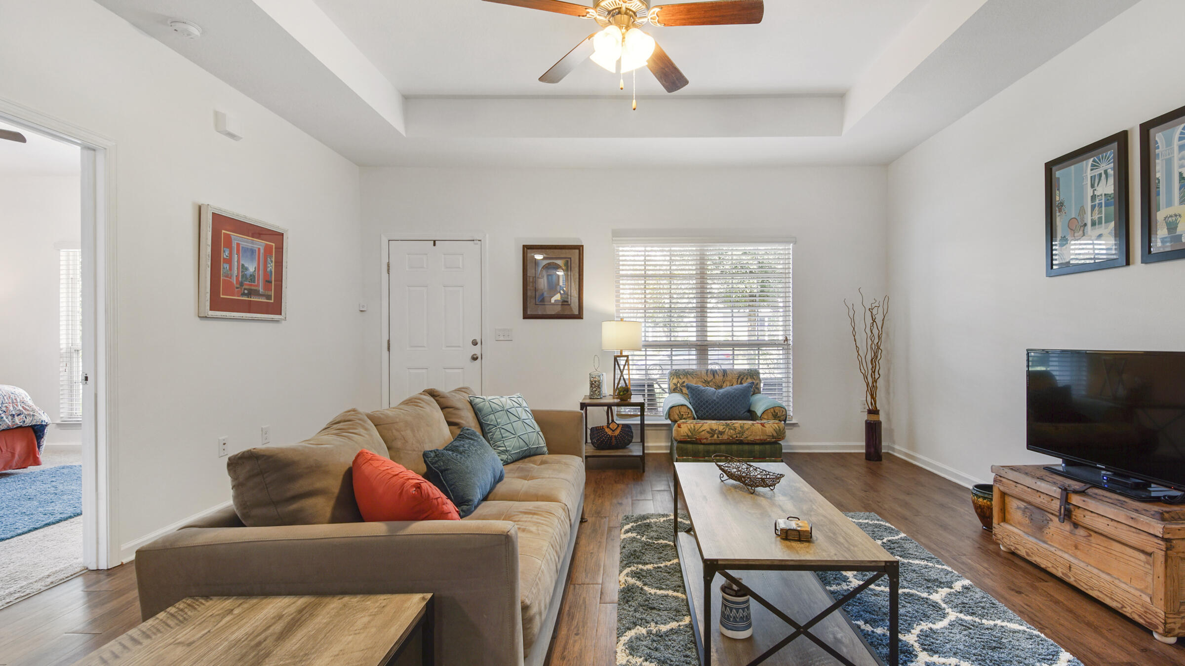 237 Nelly Street Freeport, FL 32439 - Photo 41 of 42 a living room with furniture and a flat screen tv