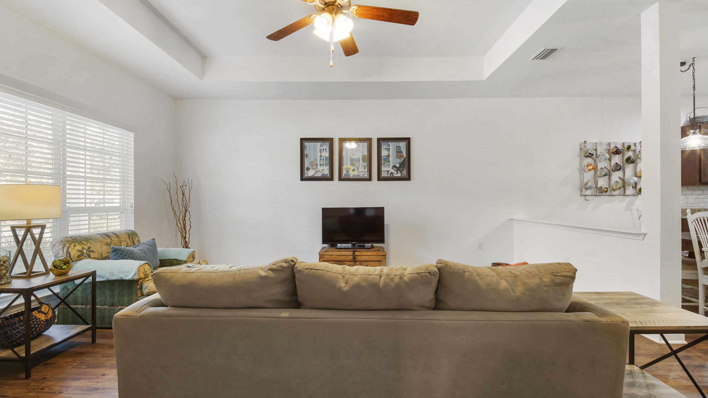237 Nelly Street Freeport, FL 32439 - Photo 3 of 42 a living room with furniture and a flat screen tv