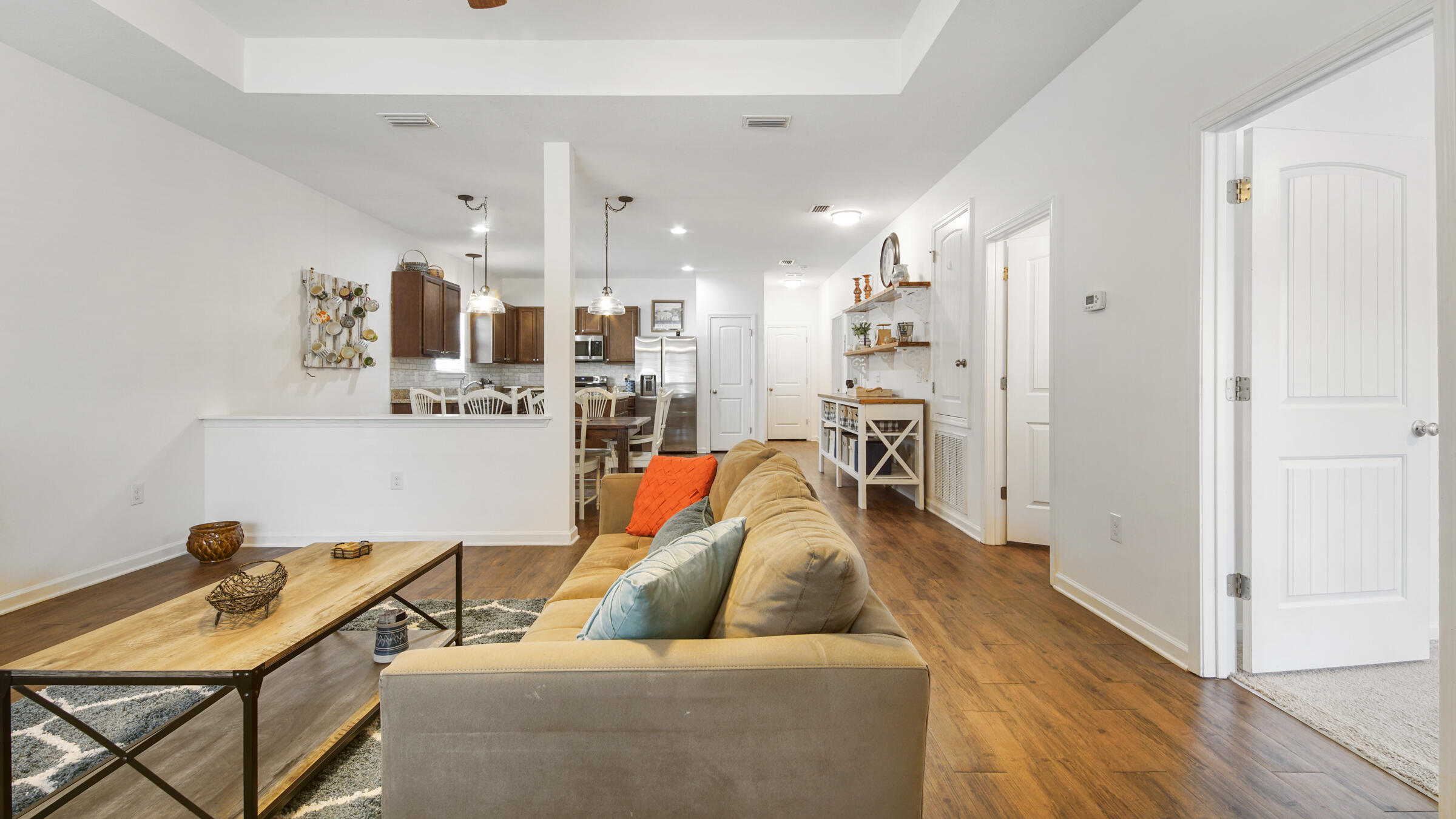 237 Nelly Street Freeport, FL 32439 - Photo 4 of 42 a living room with furniture and a kitchen view