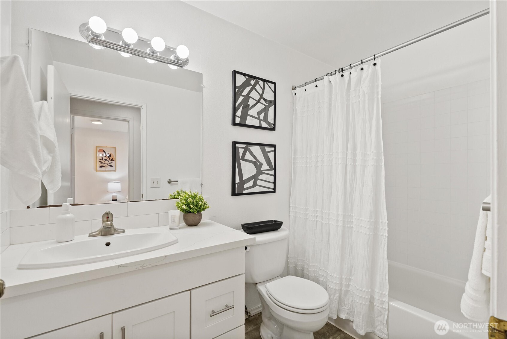 2626 East Madison Street, Unit 11 Seattle, WA 98112 - Photo 11 of 29 a bathroom with a toilet sink and shower