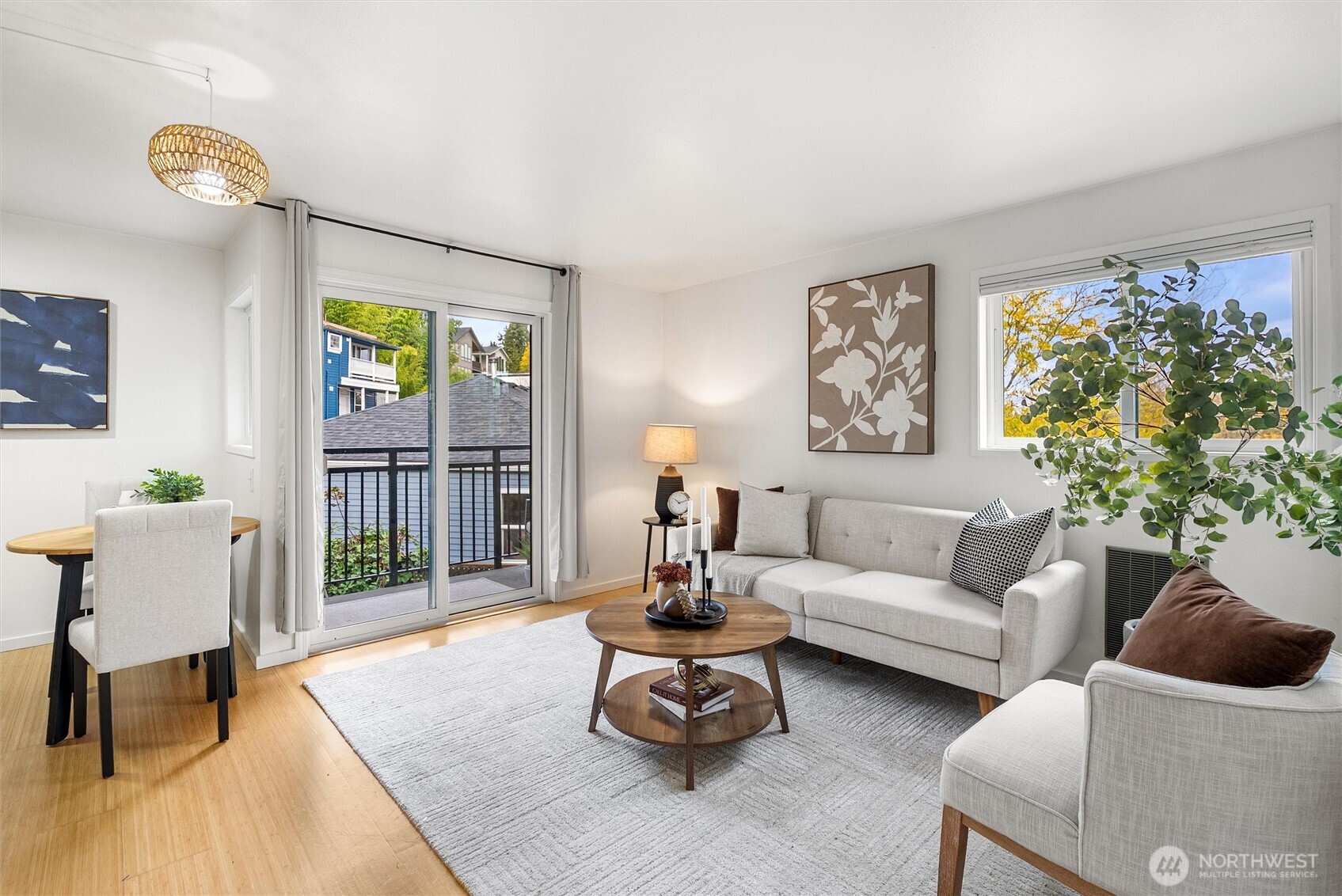 2626 East Madison Street, Unit 11 Seattle, WA 98112 - Photo 12 of 29 a living room with furniture and a potted plant