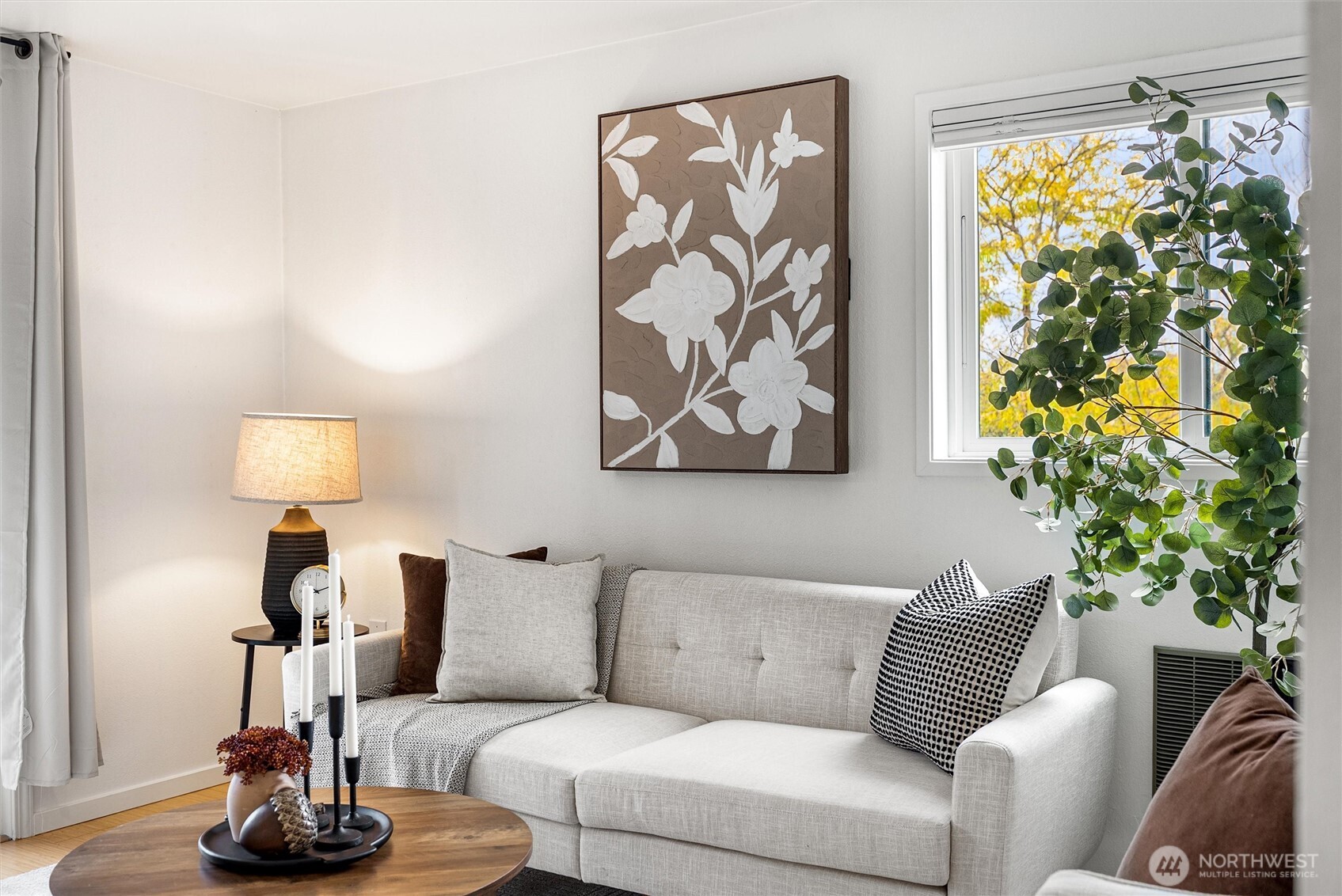 2626 East Madison Street, Unit 11 Seattle, WA 98112 - Photo 13 of 29 a living room with furniture and a potted plant