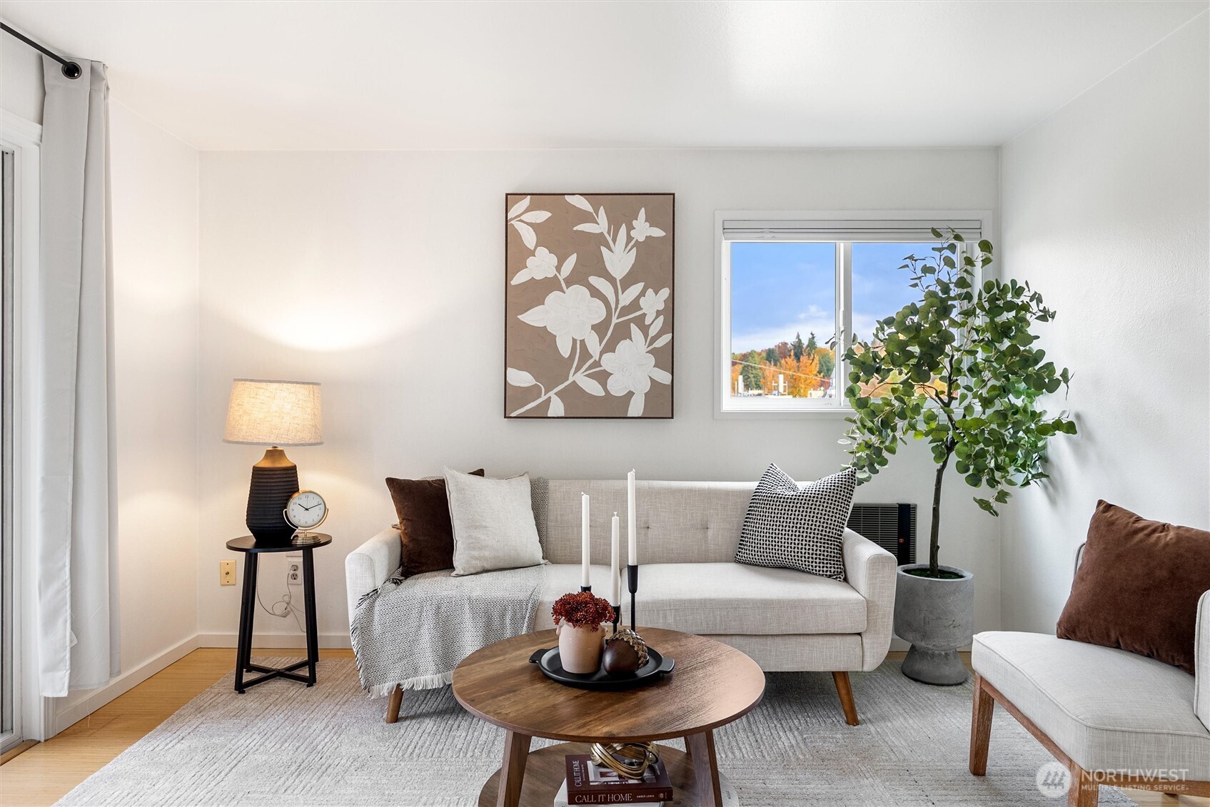 2626 East Madison Street, Unit 11 Seattle, WA 98112 - Photo 14 of 29 a living room with furniture and a potted plant