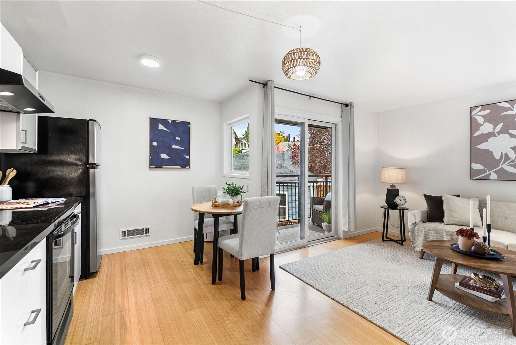 2626 East Madison Street, Unit 11 Seattle, WA 98112 - Photo 17 of 29 a living room with furniture and a flat screen tv