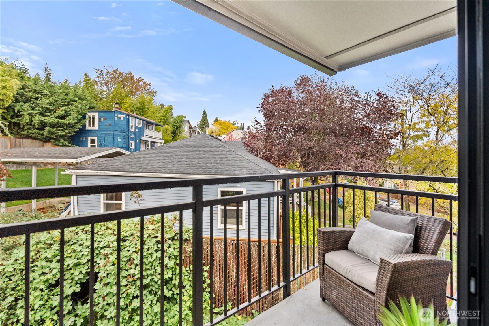 2626 East Madison Street, Unit 11 Seattle, WA 98112 - Photo 21 of 29 a view of a two chairs in the balcony