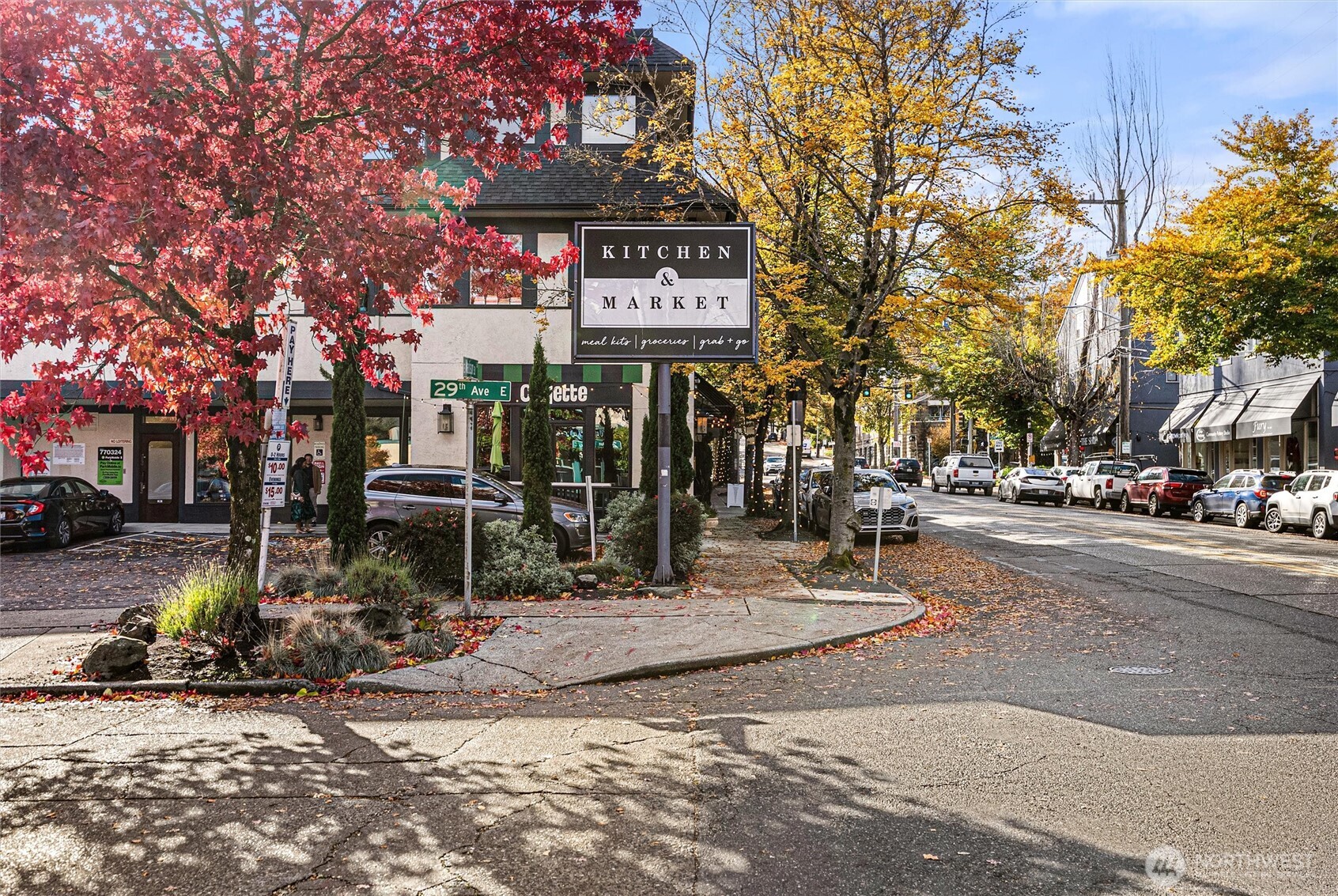 2626 East Madison Street, Unit 11 Seattle, WA 98112 - Photo 25 of 29 a view of a street with stores
