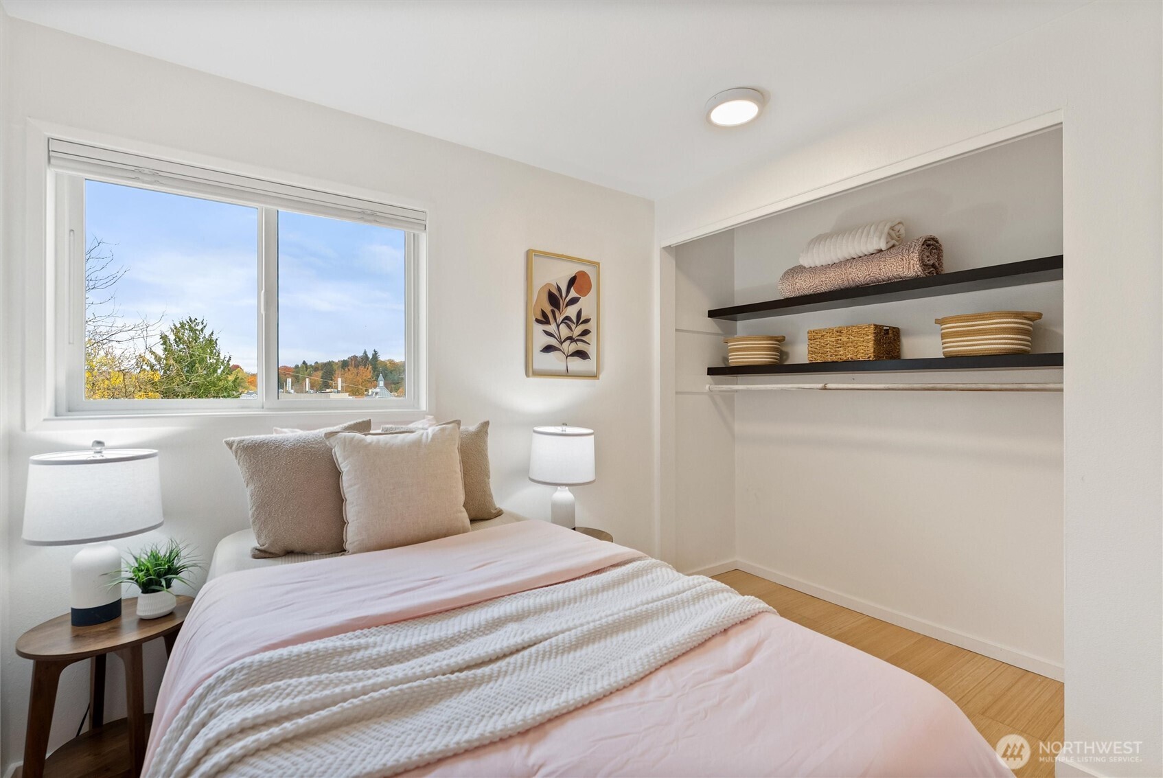 2626 East Madison Street, Unit 11 Seattle, WA 98112 - Photo 9 of 29 a bedroom with a bed and a window