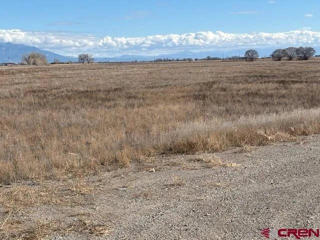 a view of an ocean and mountain
