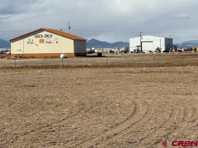 a view of a car park next to a building