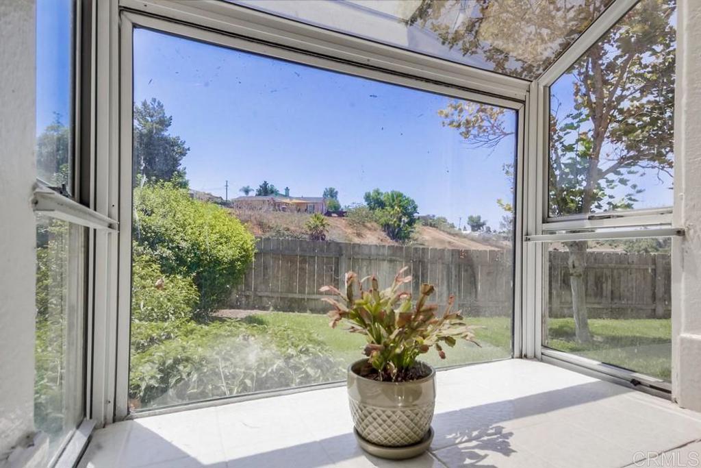 6454 Quarry Road, Unit 9 Spring Valley, CA 91977 - Photo 12 of 26 a view of a porch with potted plants