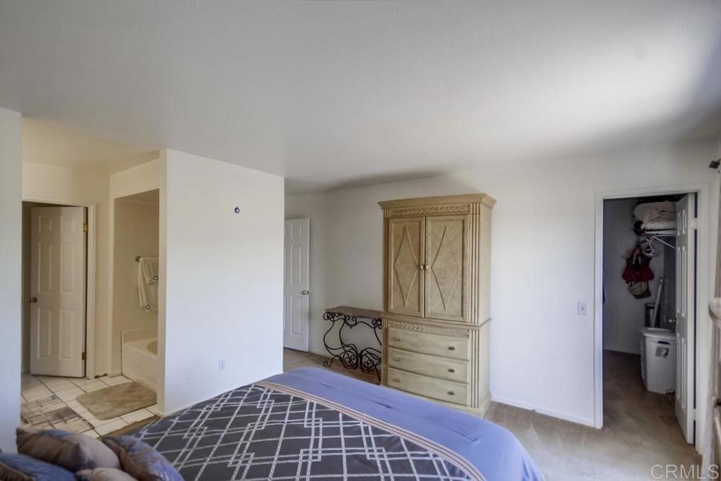 6454 Quarry Road, Unit 9 Spring Valley, CA 91977 - Photo 16 of 26 a view of room with windows