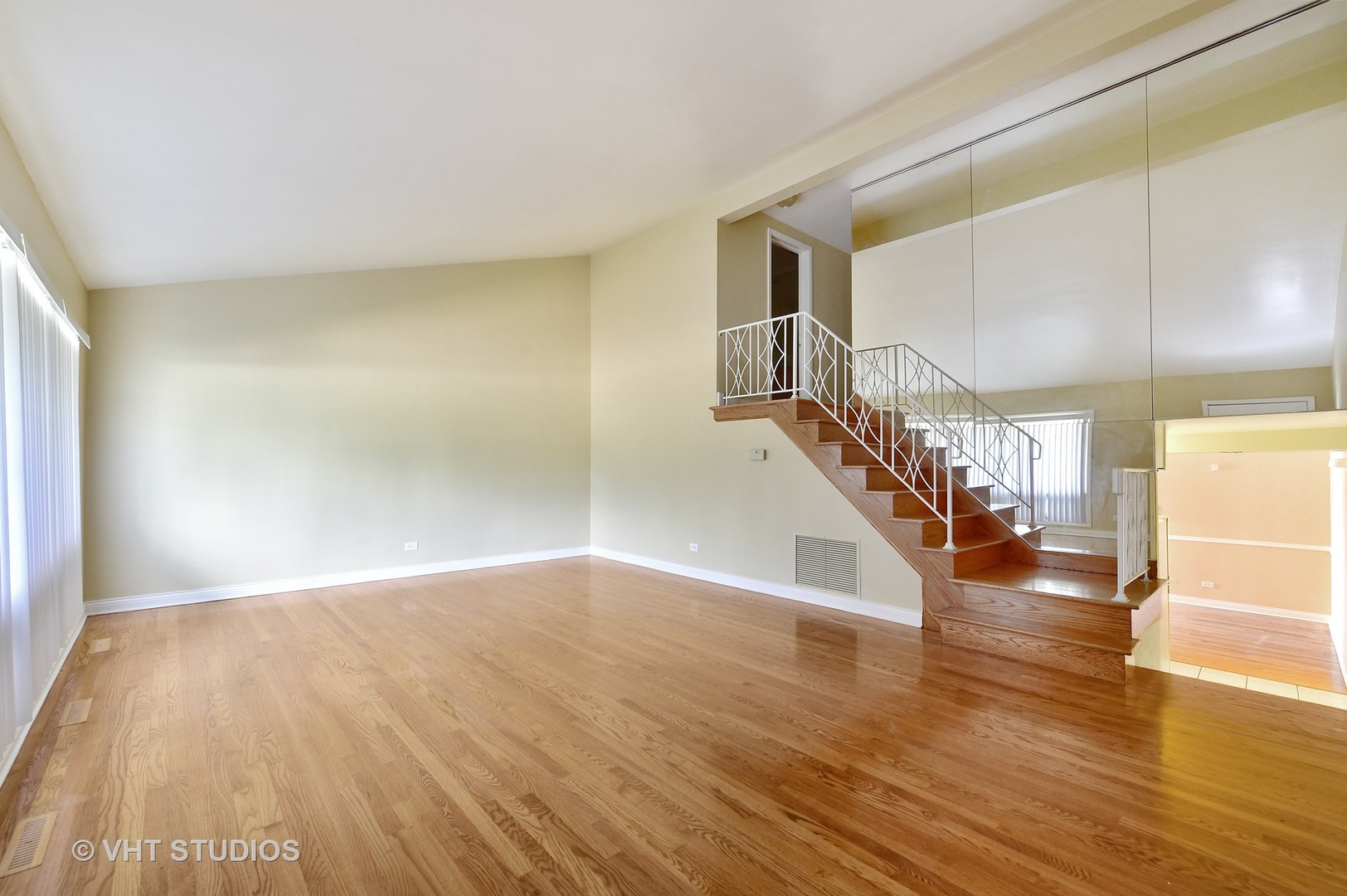 1247 South Mannheim Road, Unit 3 Westchester, IL 60154 - Photo 2 of 12 a view of entryway and hall with wooden floor
