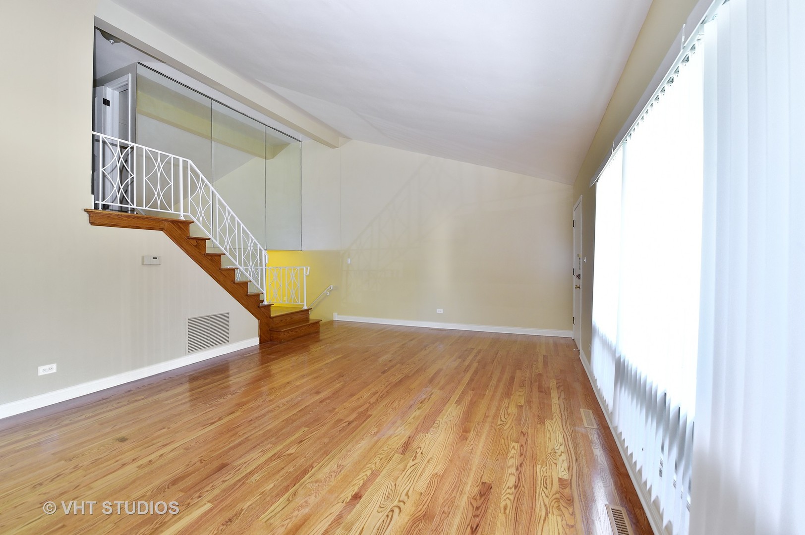 1247 South Mannheim Road, Unit 3 Westchester, IL 60154 - Photo 3 of 12 a view of an entryway with wooden floor