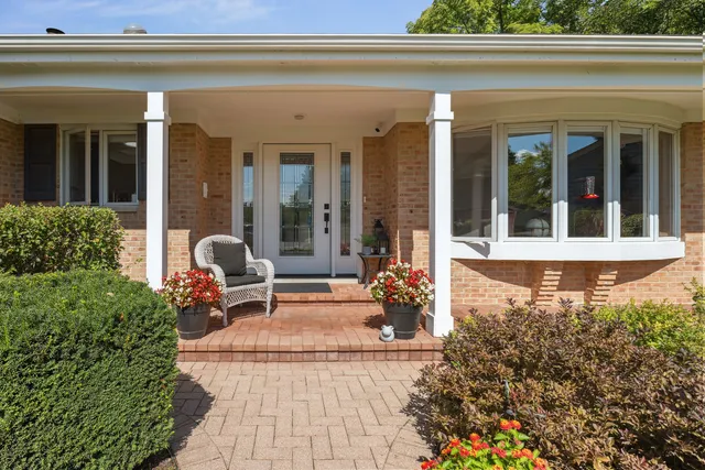 a front view of a house with a porch