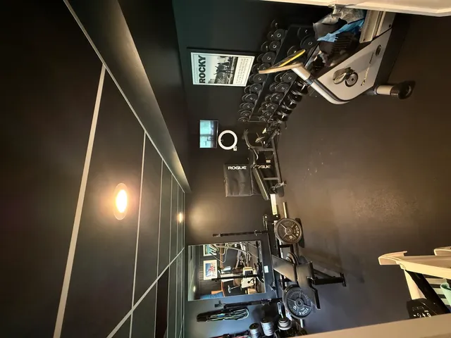 a view of a chairs and table in the balcony