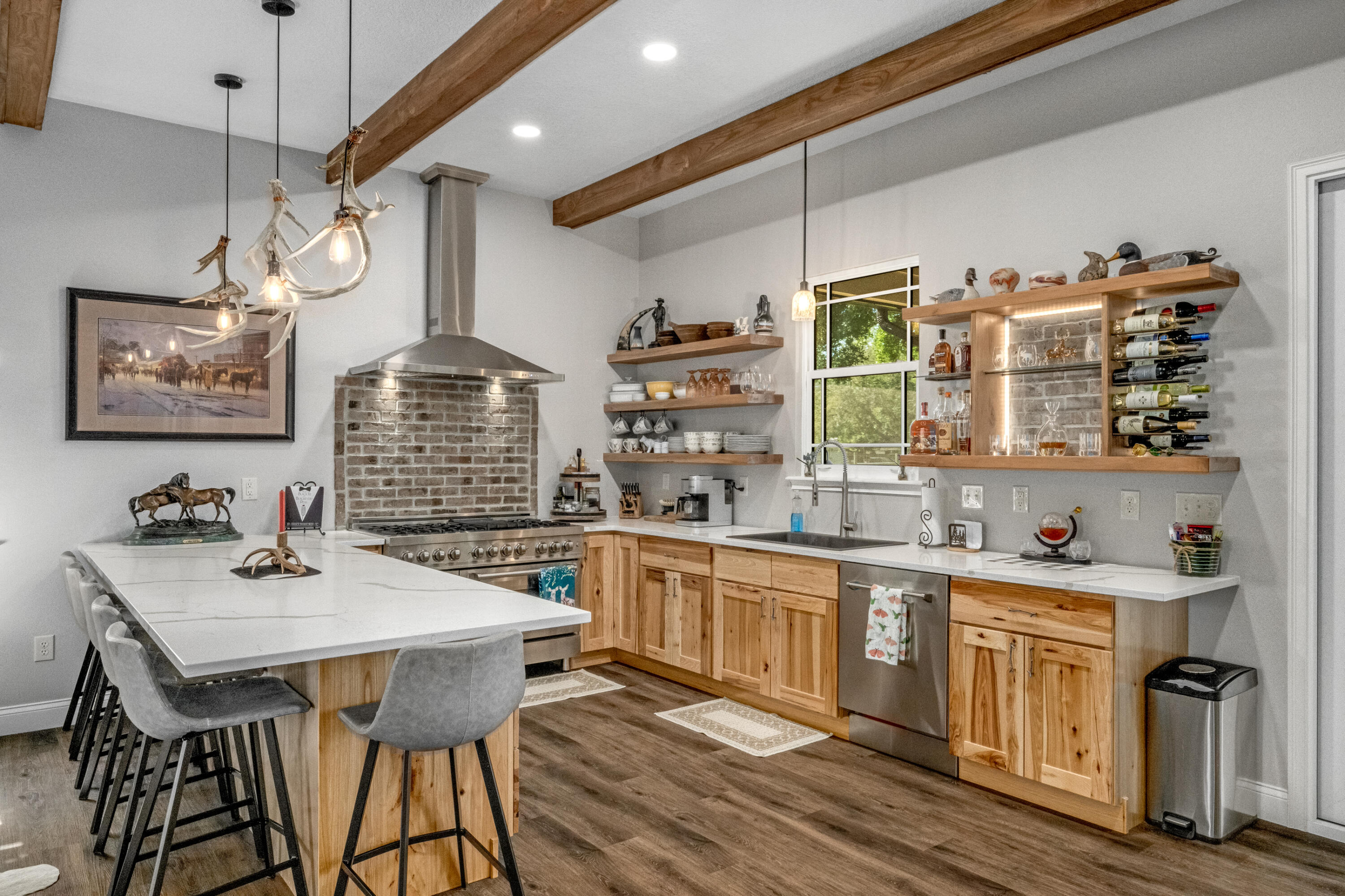 4600 Dixie Way Mims, FL 32754 - Photo 12 of 86 a kitchen with a table chairs stove and cabinets