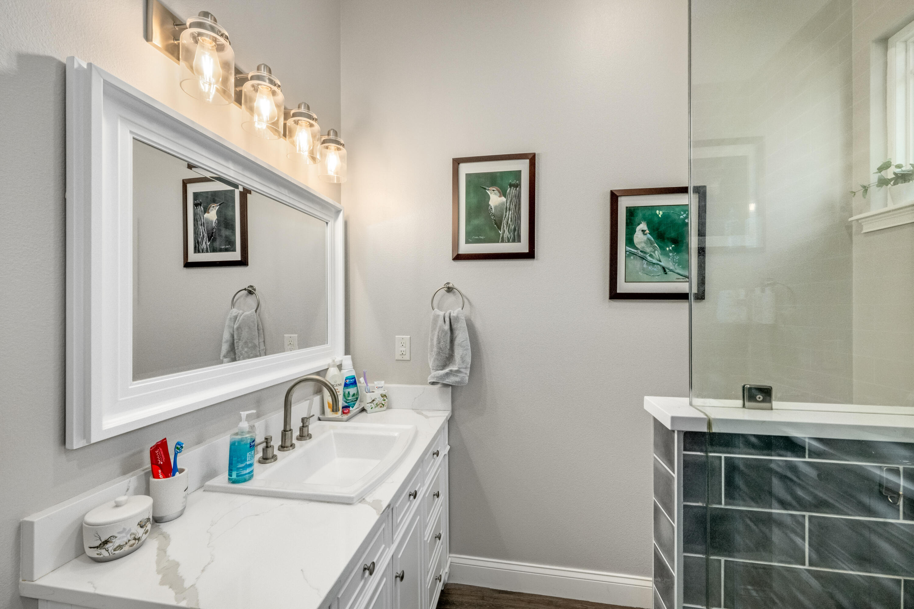 4600 Dixie Way Mims, FL 32754 - Photo 21 of 86 a bathroom with a sink vanity and a mirror