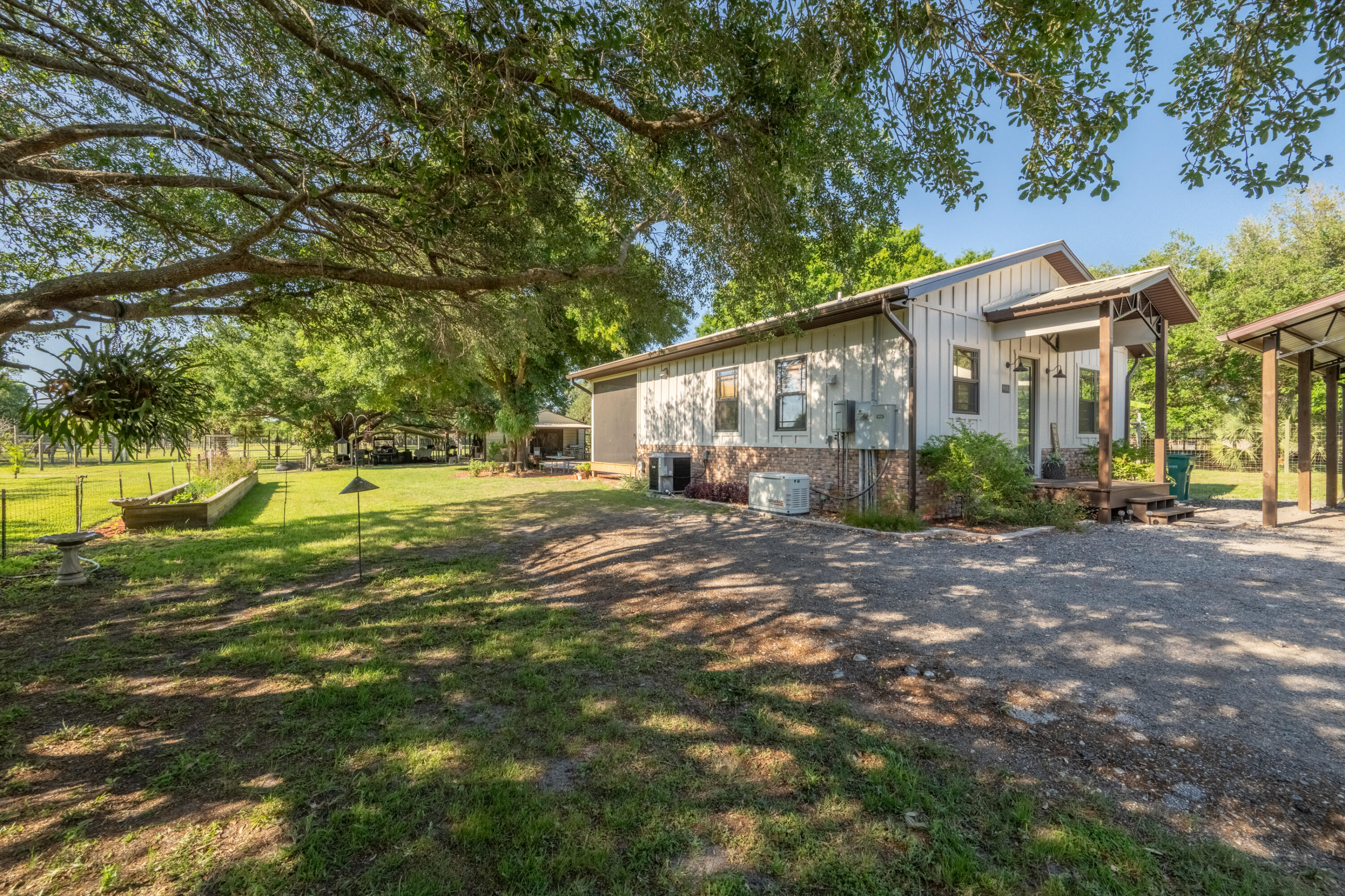 4600 Dixie Way Mims, FL 32754 - Photo 43 of 86 a view of a house with backyard and sitting area