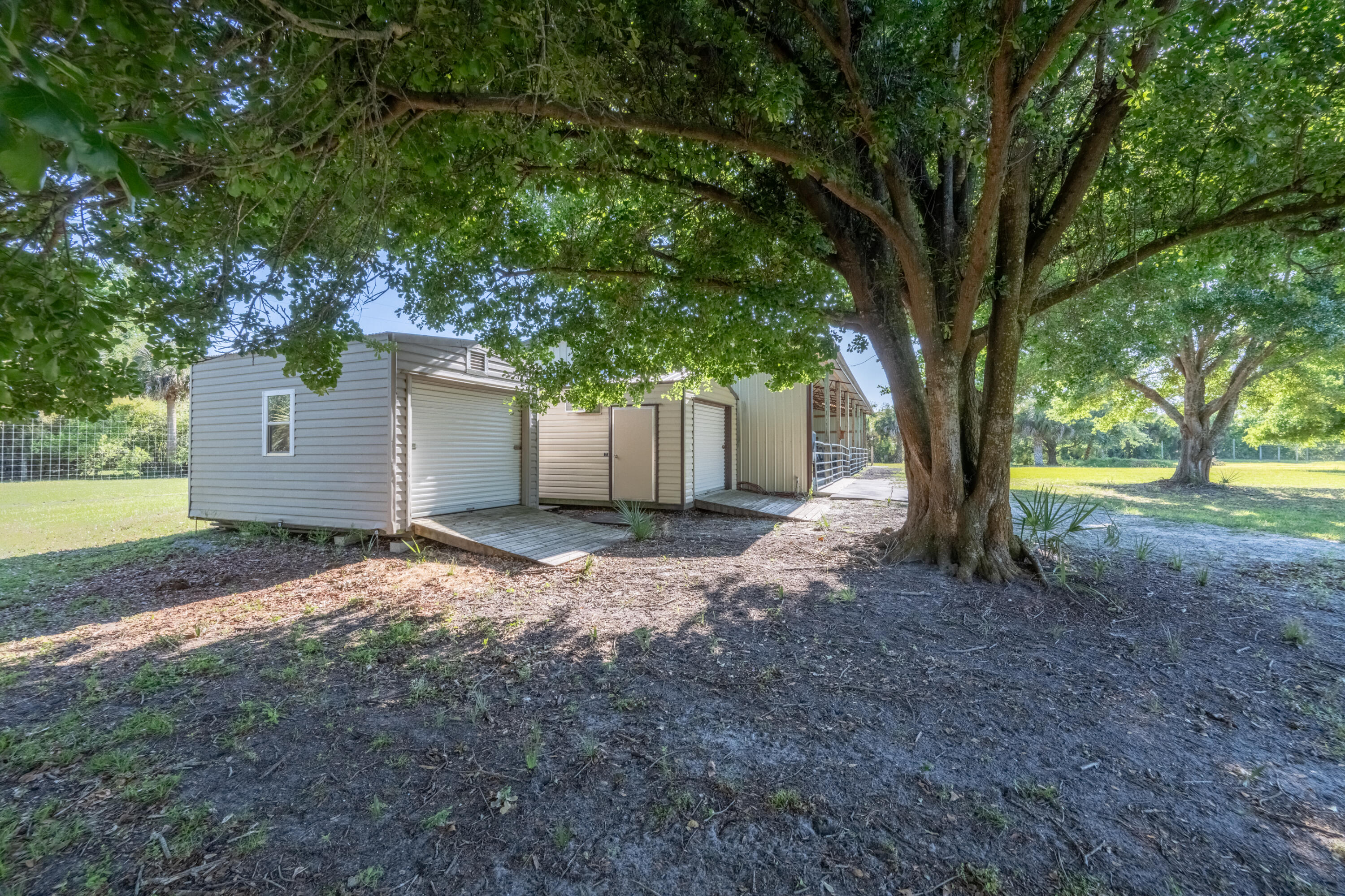 4600 Dixie Way Mims, FL 32754 - Photo 49 of 86 a view of a house with backyard and tree