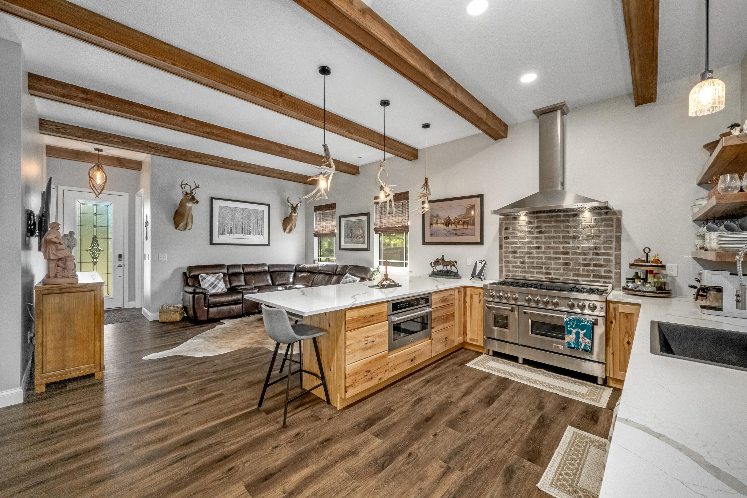 4600 Dixie Way Mims, FL 32754 - Photo 6 of 86 a kitchen with a stove a sink and a refrigerator