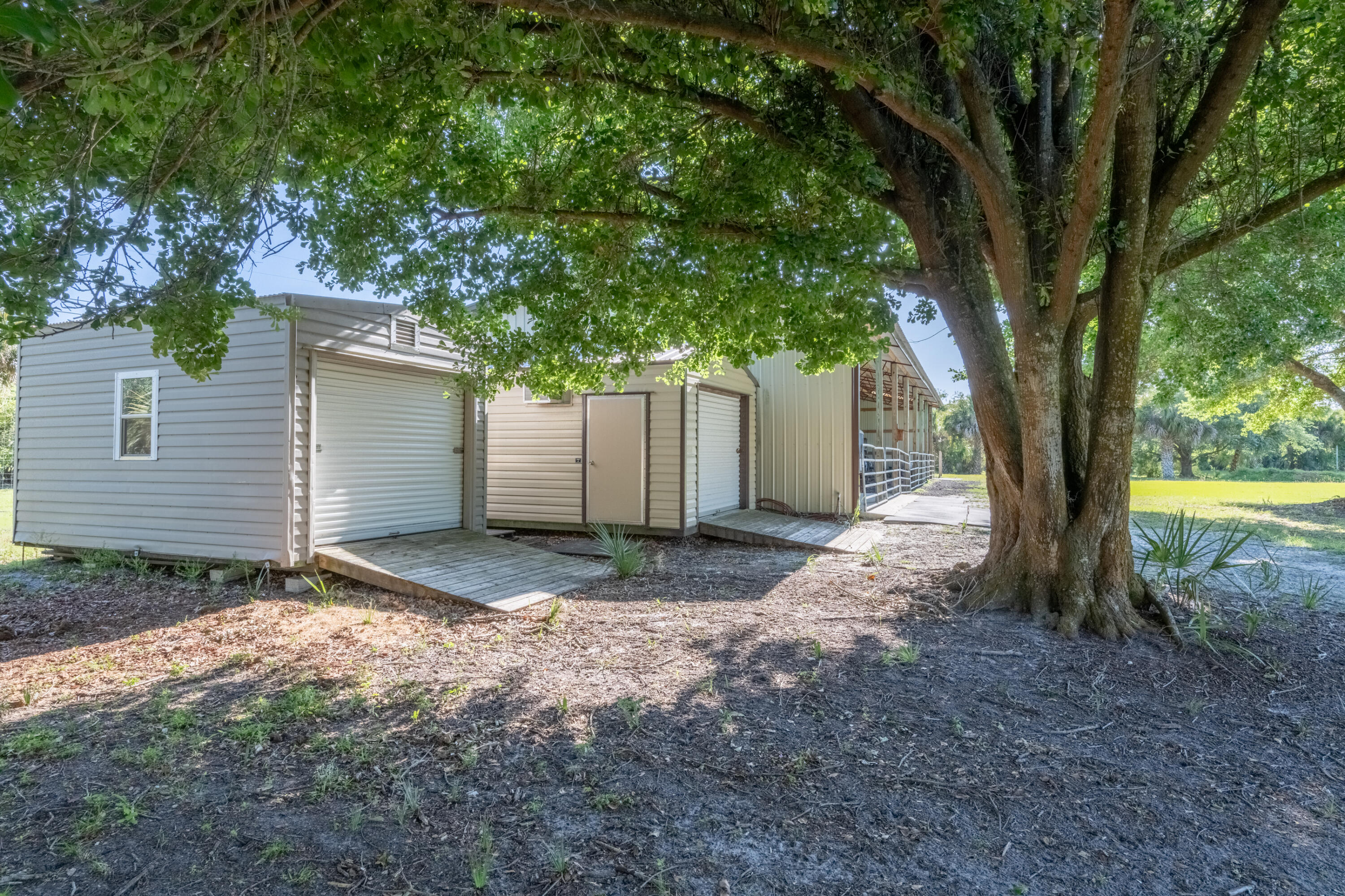 4600 Dixie Way Mims, FL 32754 - Photo 70 of 86 a view of a house with a tree and a tree