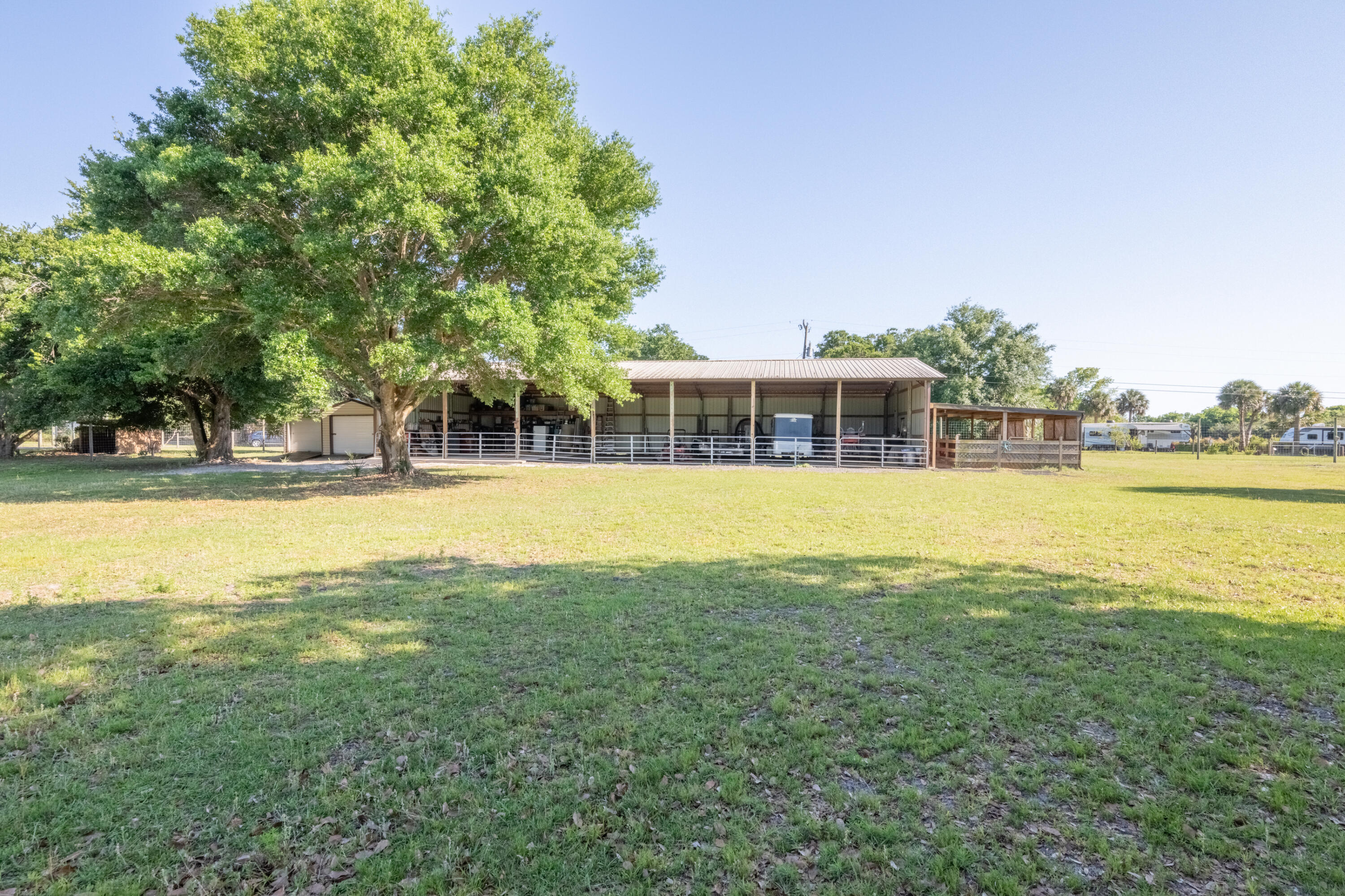 4600 Dixie Way Mims, FL 32754 - Photo 76 of 86 a view of a house with a big yard
