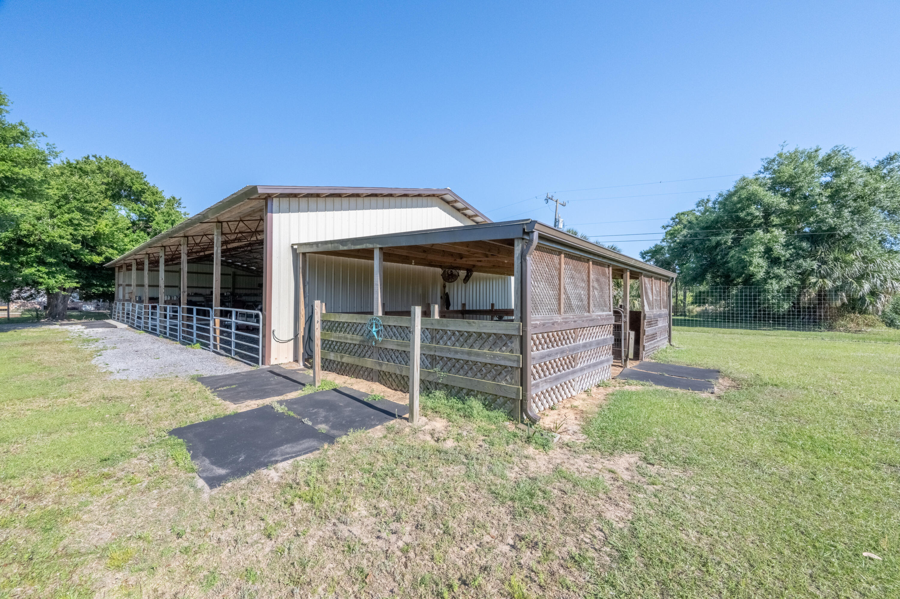 4600 Dixie Way Mims, FL 32754 - Photo 77 of 86 a view of a house with backyard and a garden