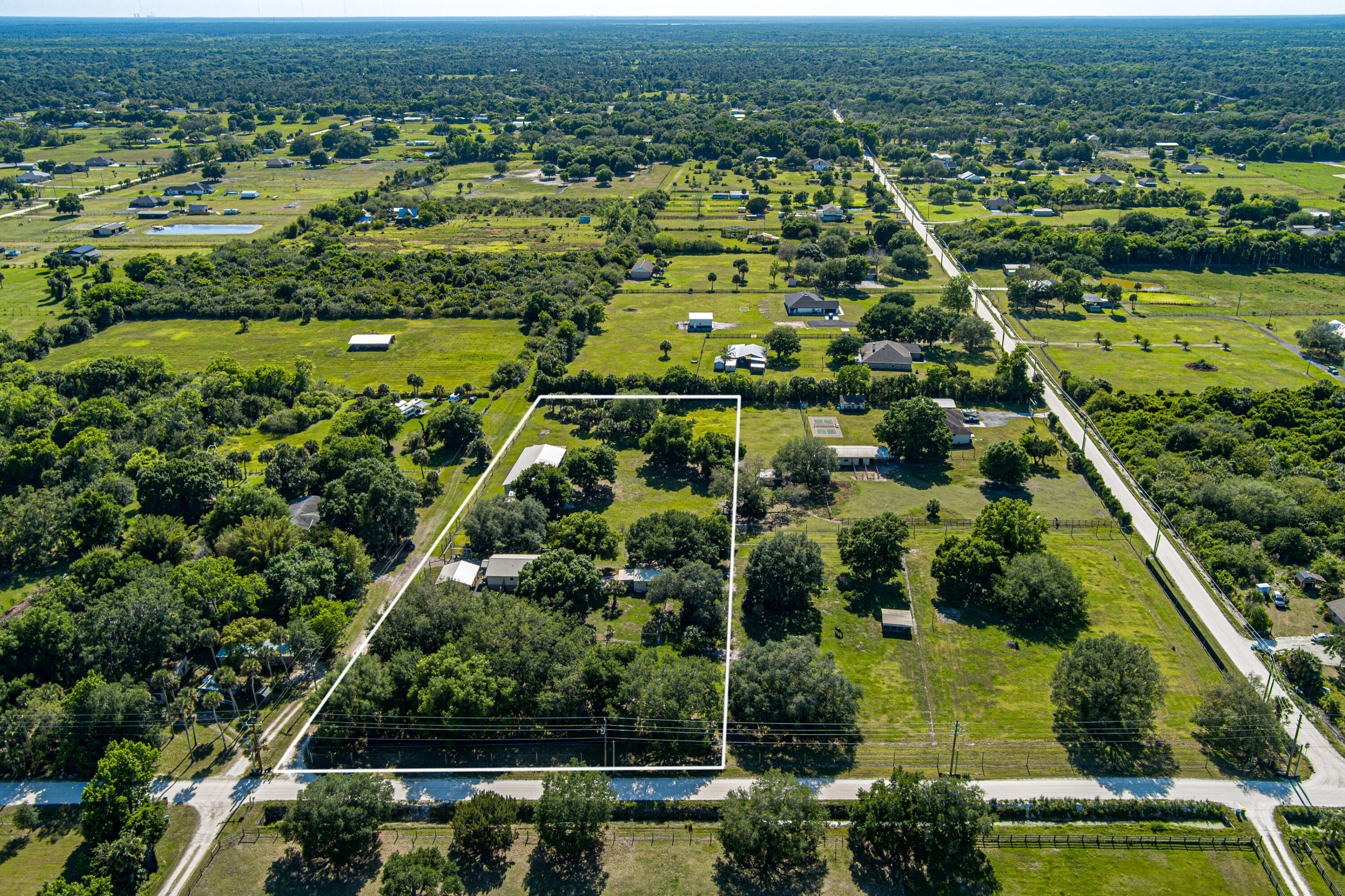 4600 Dixie Way Mims, FL 32754 - Photo 86 of 86 an aerial view of residential houses with outdoor space and swimming pool