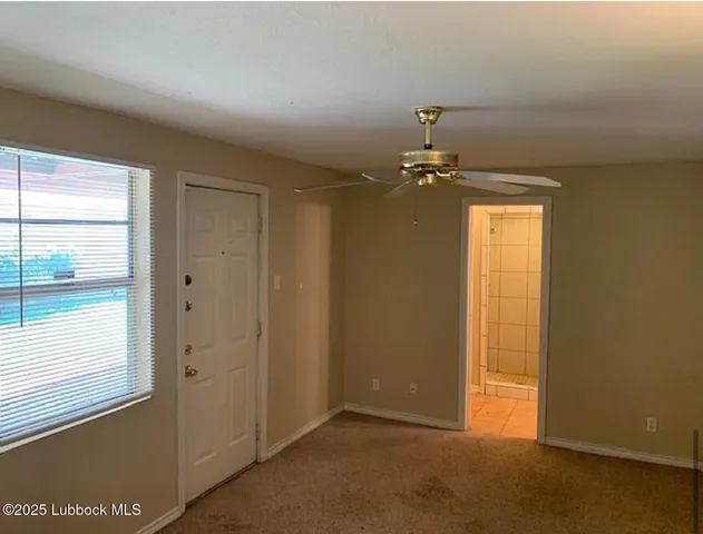 en empty room with a window