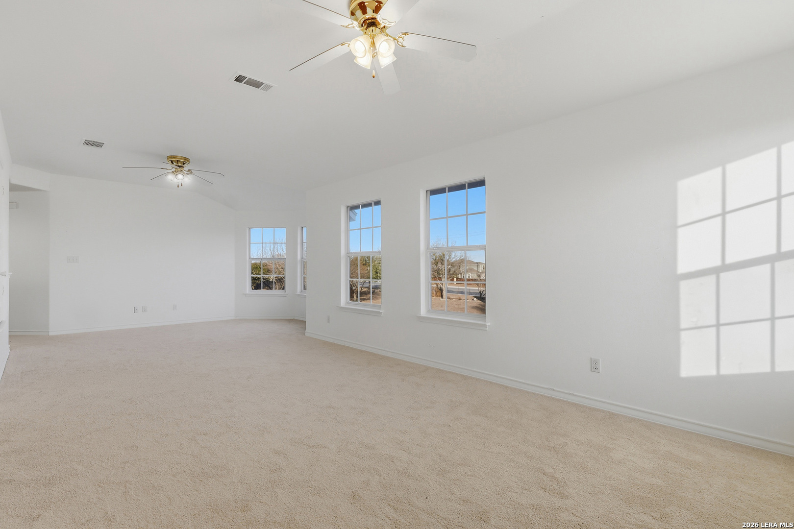 9348 Remuda Path San Antonio, TX 78254 - Photo 19 of 27 a view of an empty room with a window
