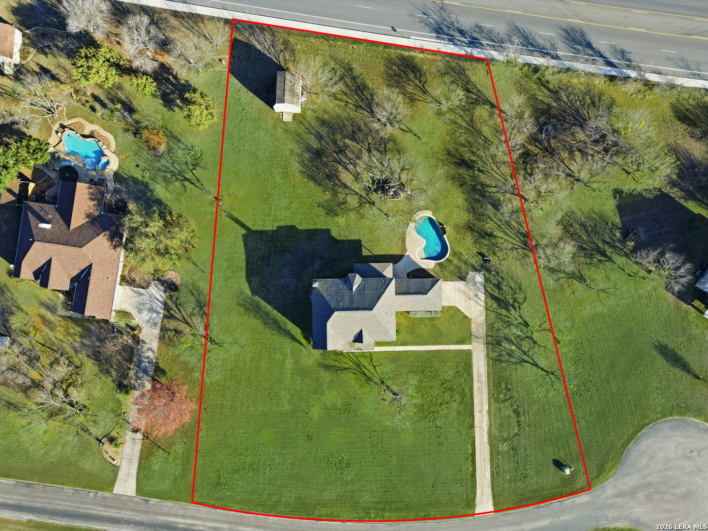 9348 Remuda Path San Antonio, TX 78254 - Photo 26 of 27 a backyard of a house with outdoor seating